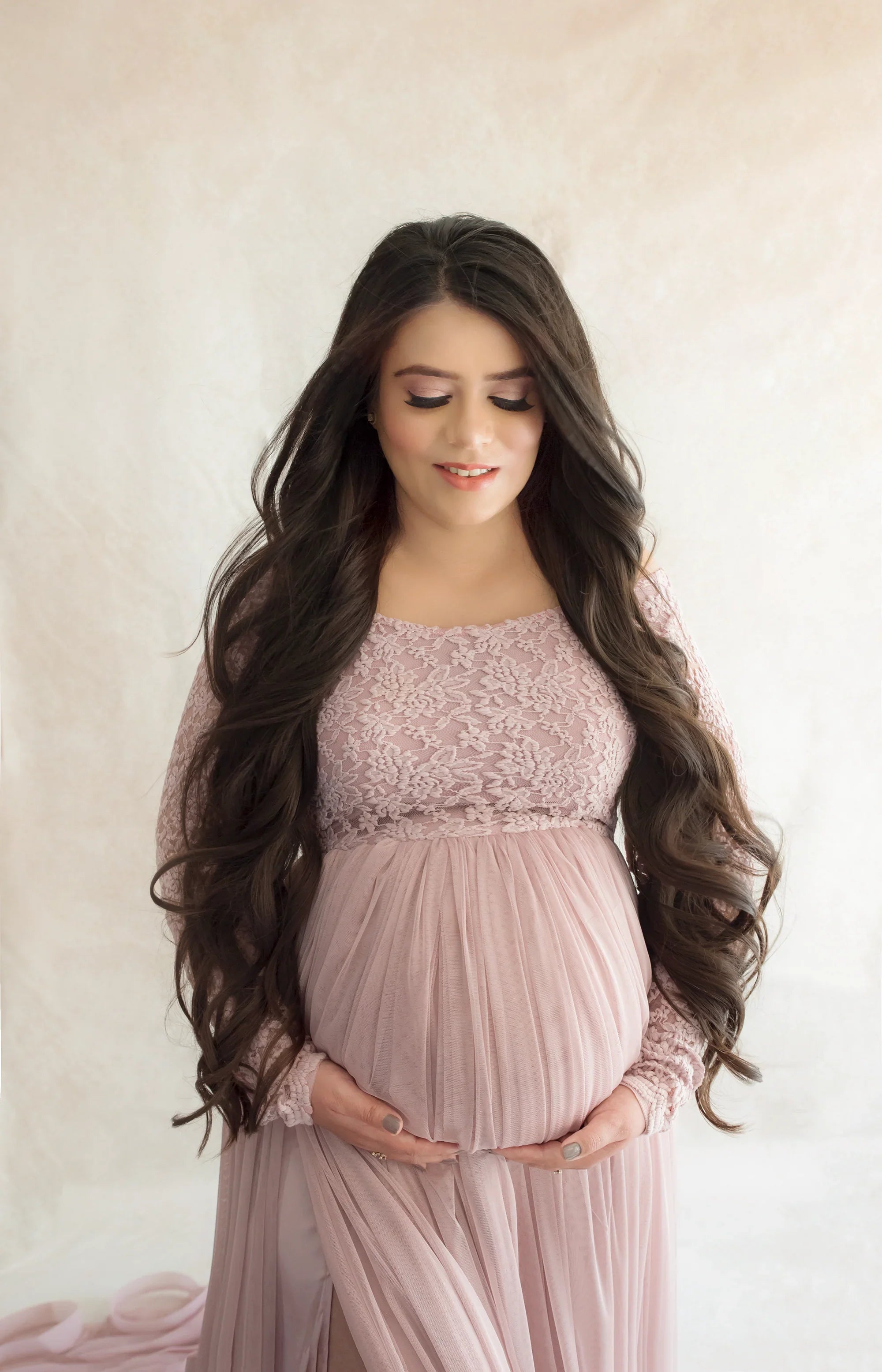 Dylan Pink Maternity Dress by FlairNFrillz featuring a flowing fabric and comfortable fit for expecting mothers.