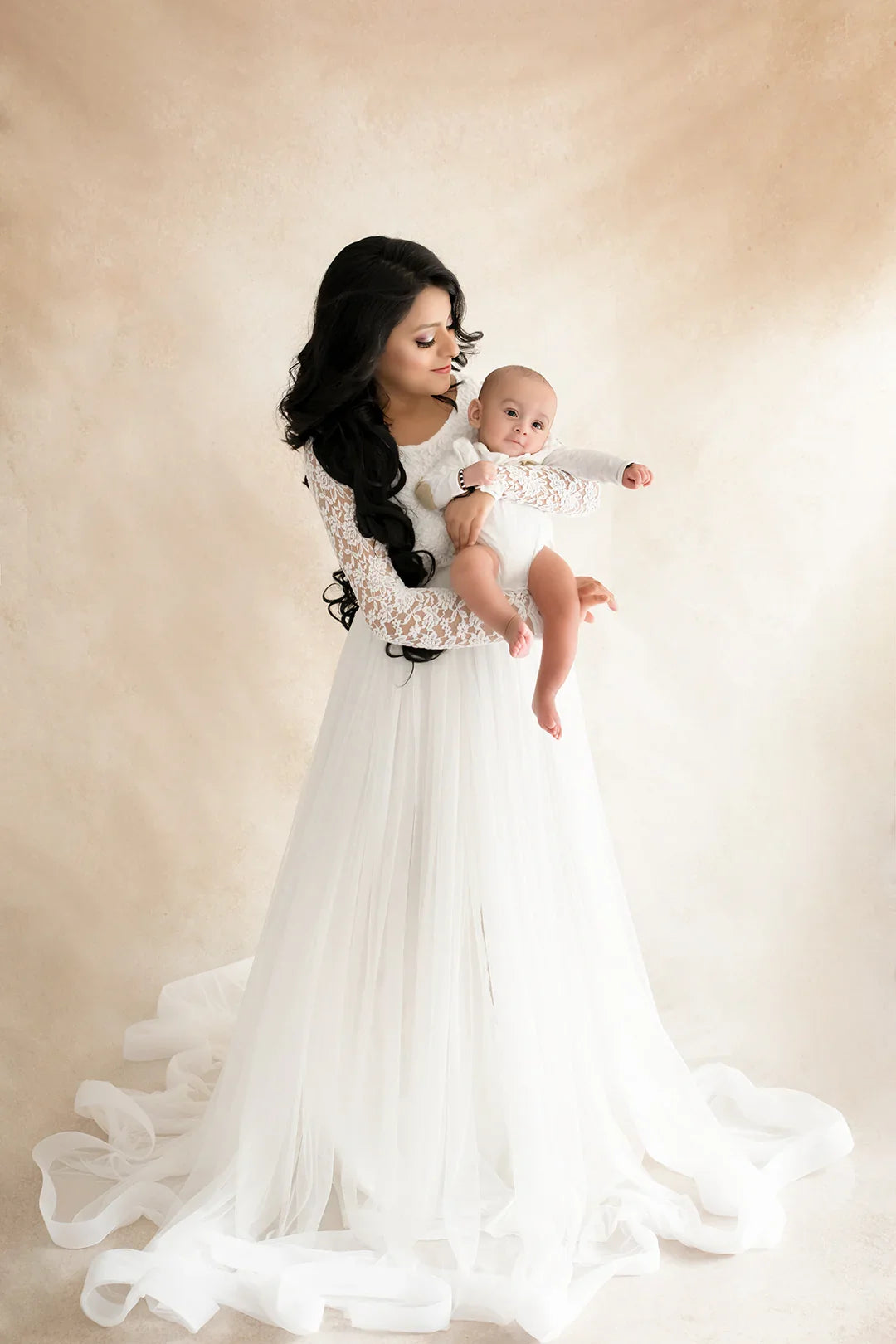 FlairNFrillz Dylan White maternity gown with flowing fabric and elegant design, perfect for expecting mothers.
