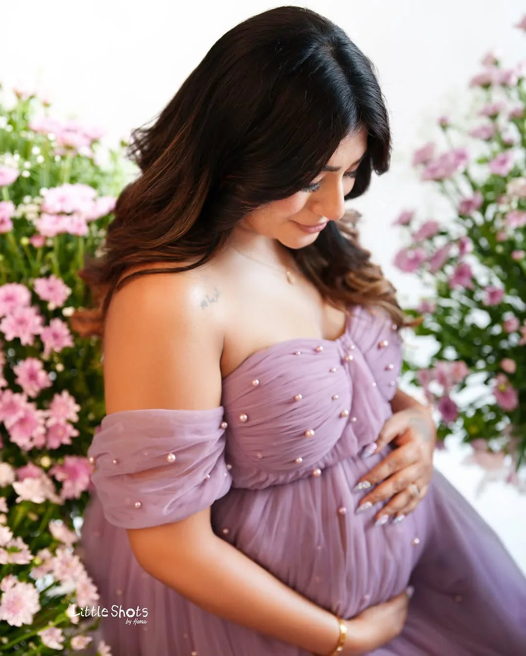 Sophia Mauve Pearl Maternity Gown by FlairNFrillz, elegant lavender dress with pearl details, designed for expecting mothers.