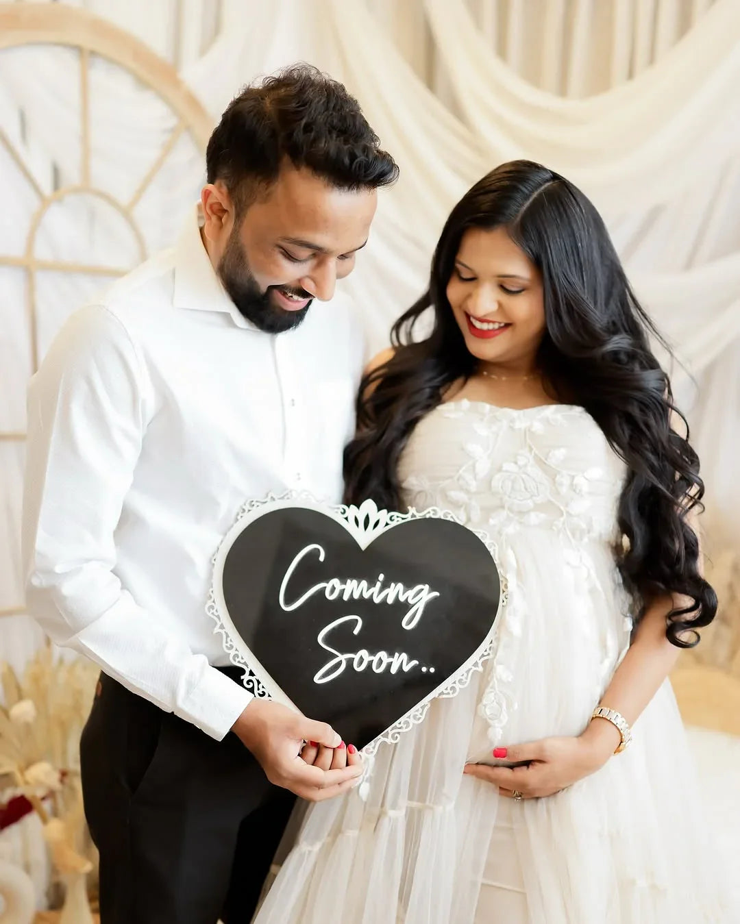Maternity Elsa gown by FlairNFrillz featuring a flowing fabric and elegant design, perfect for expecting mothers.