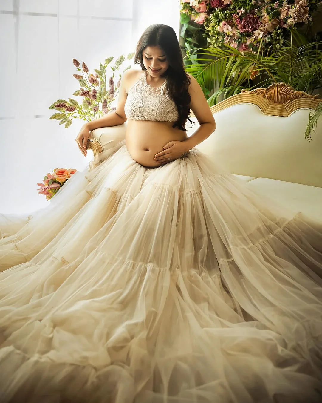 Molly Ash White maternity gown by FlairNFrillz featuring flowing fabric and elegant design for expecting mothers.