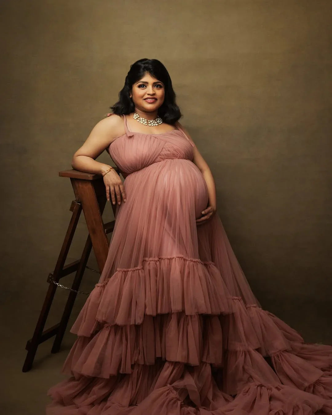 Mauve maternity gown by FlairNFrillz featuring a flowing design, perfect for expecting mothers, showcased in a full-length image.