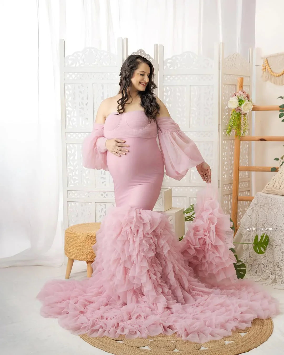 Pink Kiara maternity gown by FlairNFrillz featuring a flowing fabric and elegant design, perfect for expecting mothers.
