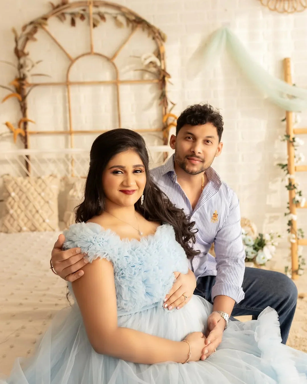 Blue Erin maternity gown by FlairNFrillz featuring a flowing fabric and elegant design for comfortable pregnancy wear.