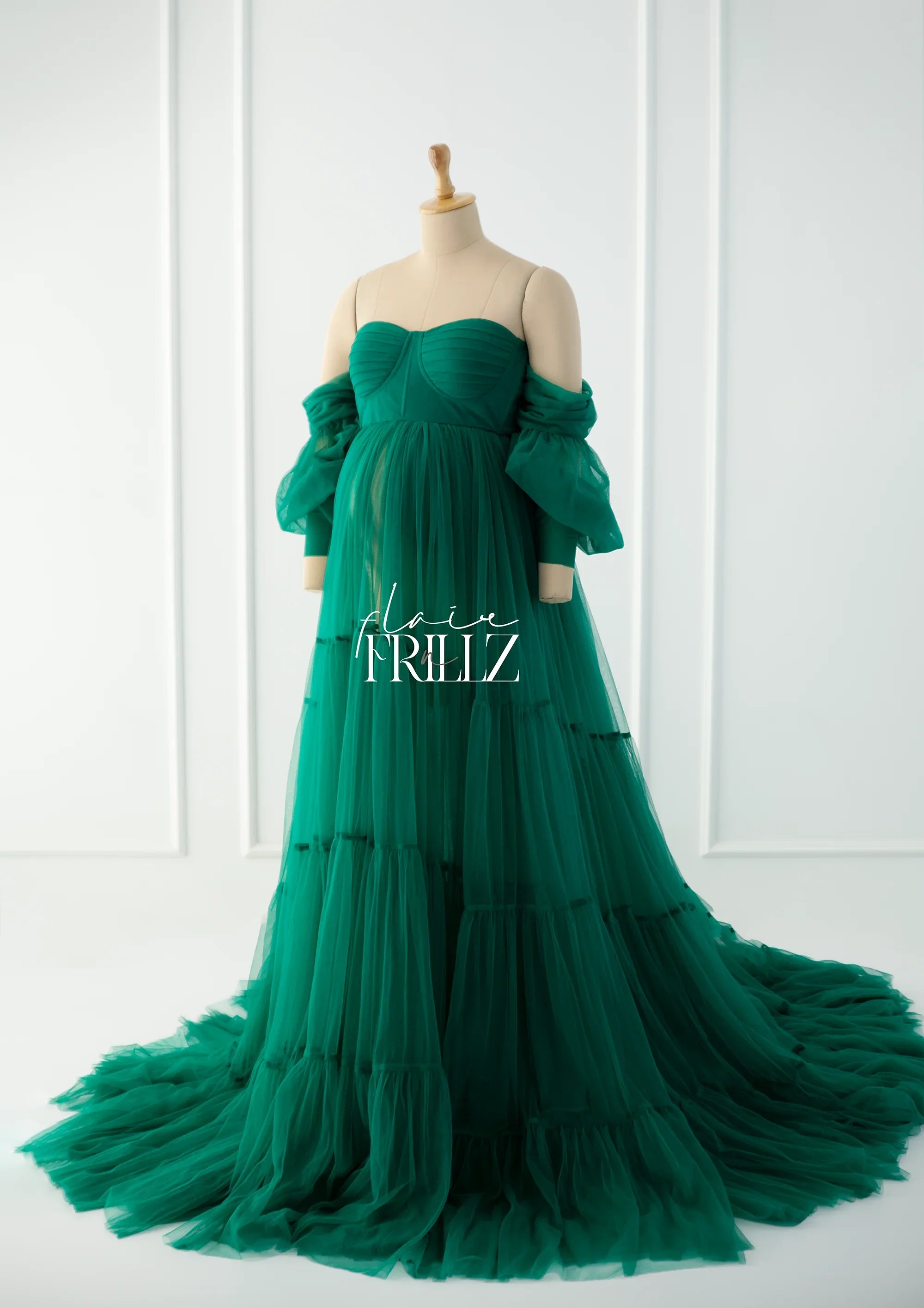 FlairNFrillz Sasha Green Maternity Gown showing flowing fabric and elegant design perfect for expecting mothers.