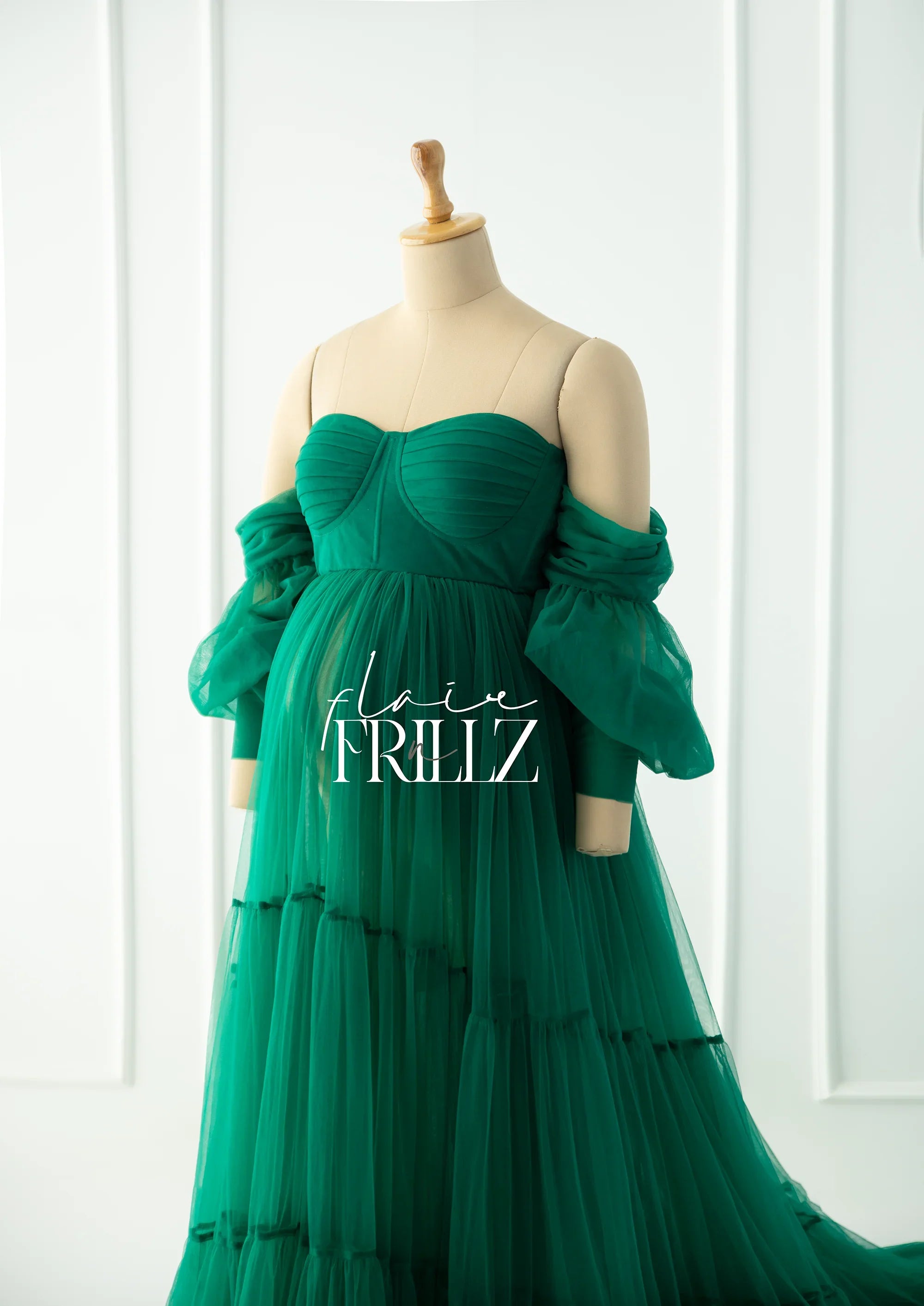 Green maternity gown by FlairNFrillz featuring a flowing design and elegant fit, perfect for expecting moms.