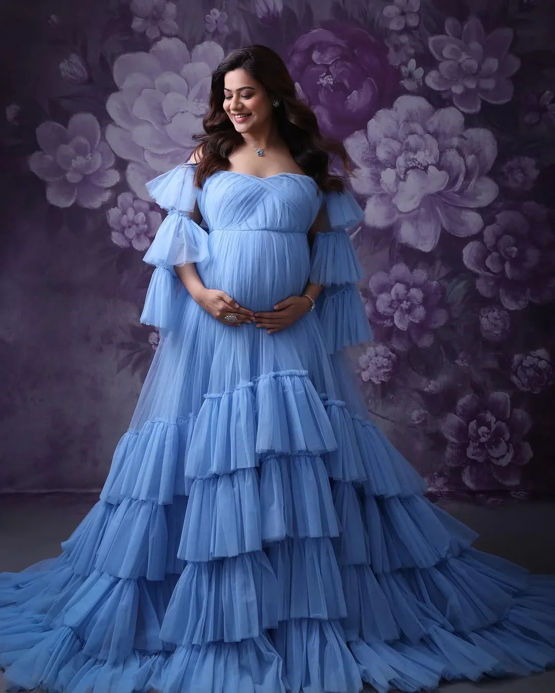Blue Keira maternity gown by FlairNFrillz, flowing fabric, elegant design, perfect for expecting mothers.