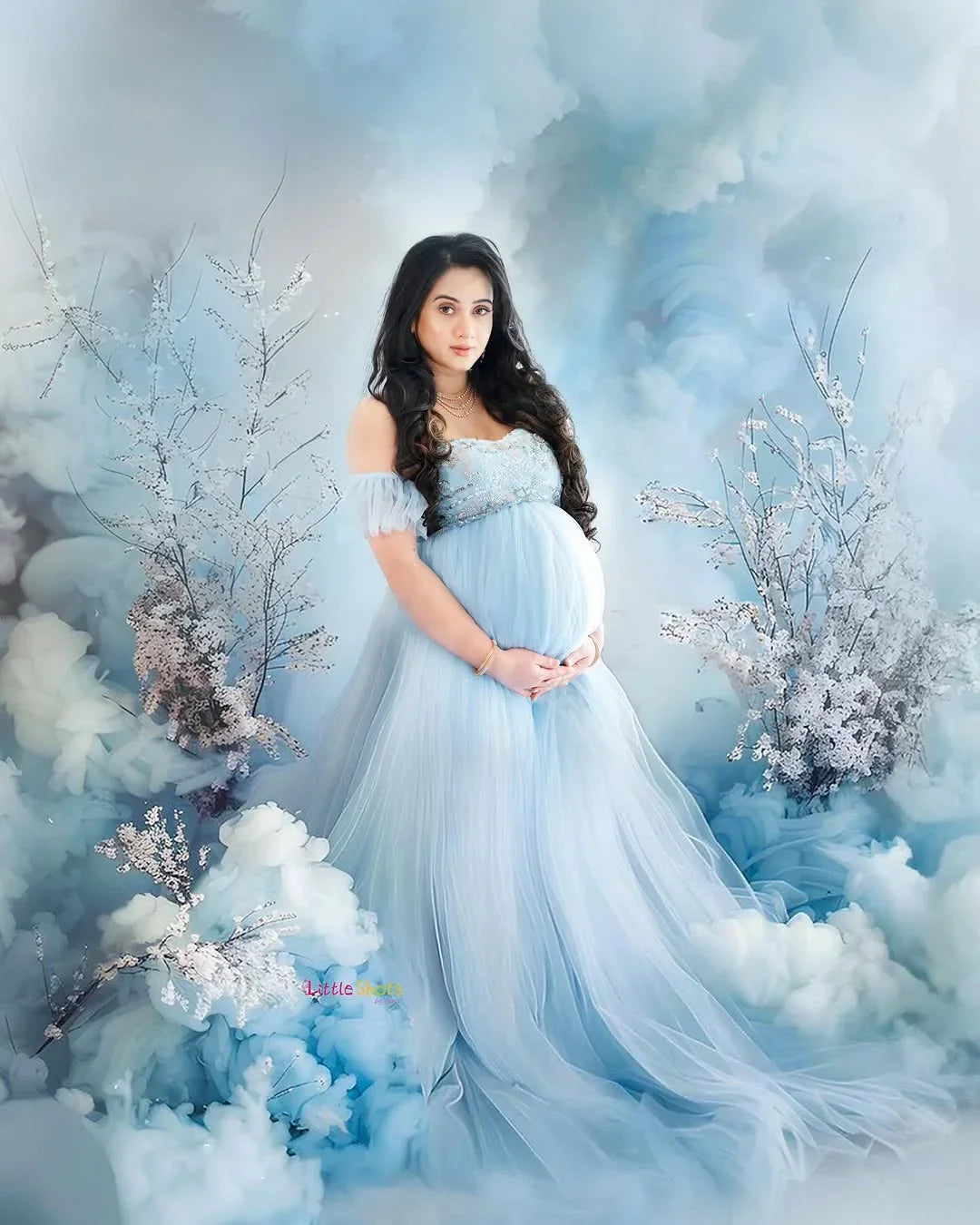 FlairNFrillz Kaya Blue Sequin Maternity Gown with elegant flowing fabric and intricate sequin details for special occasions.
