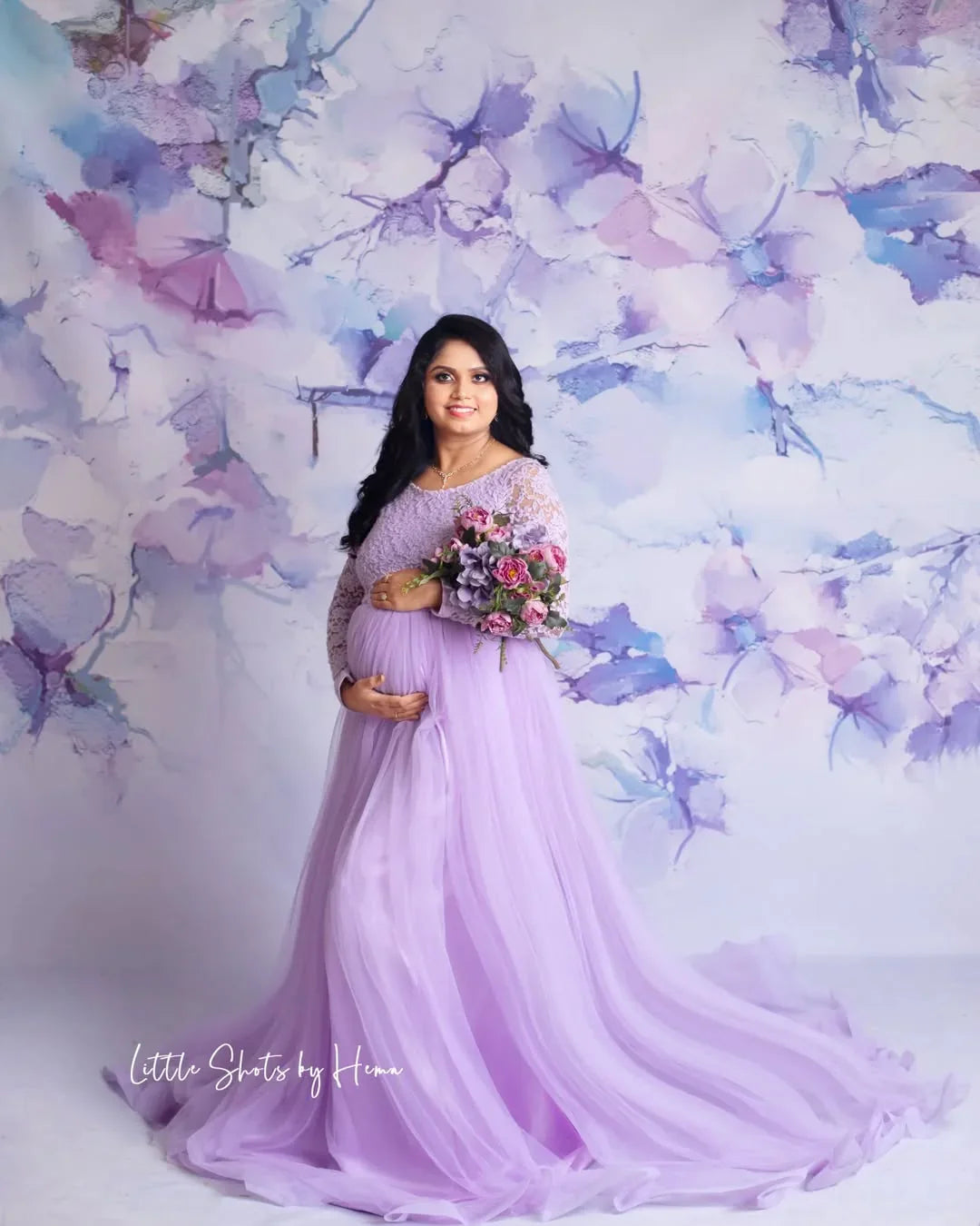 Dylan Lavender Maternity Dress by FlairNFrillz featuring a flowing gown with lavender fabric and comfortable fit, perfect for expecting mothers.