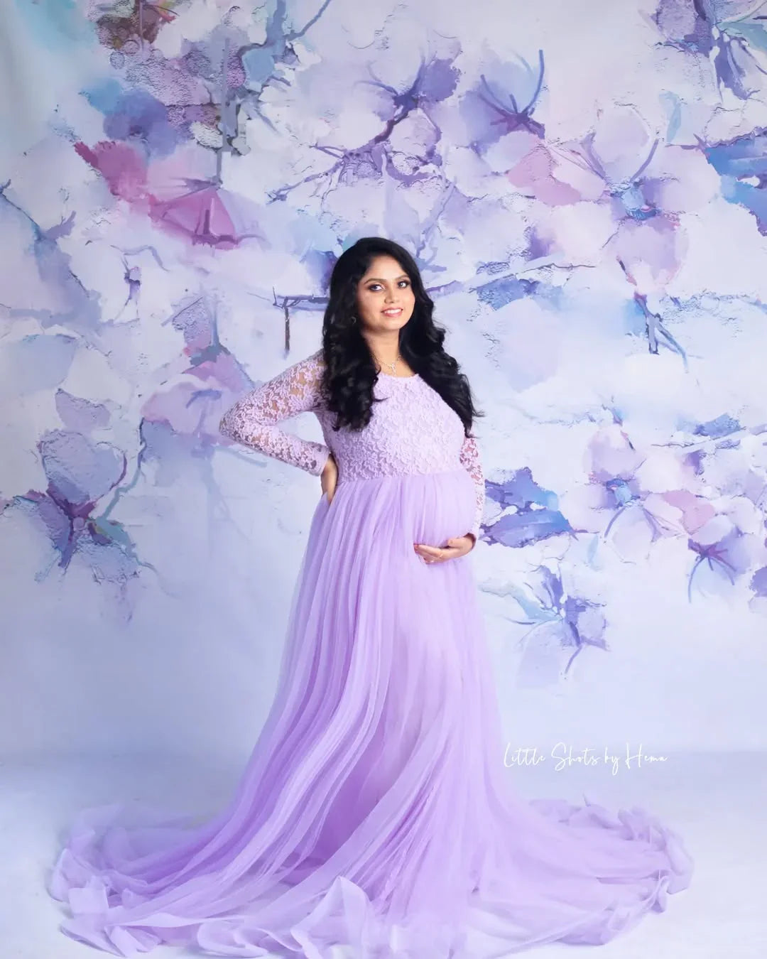 Dylan Lavender Maternity Gown by FlairNFrillz featuring flowing fabric and elegant design for expecting mothers.