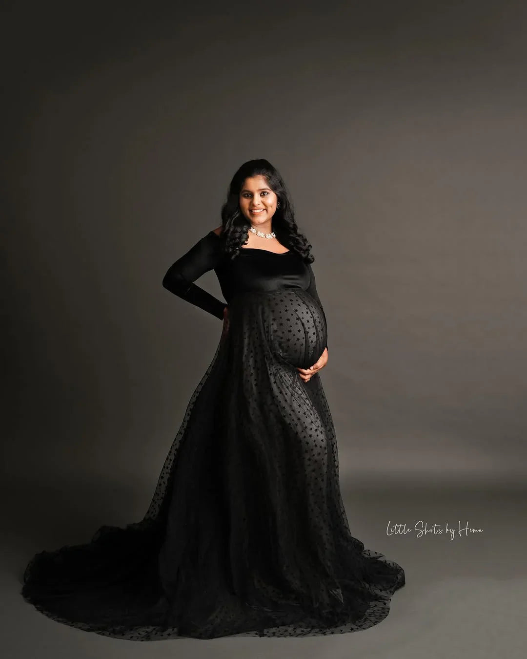 FlairNFrillz Iliana Maternity Dress in soft fabric, featuring a flowing silhouette and elegant design for expecting mothers.
