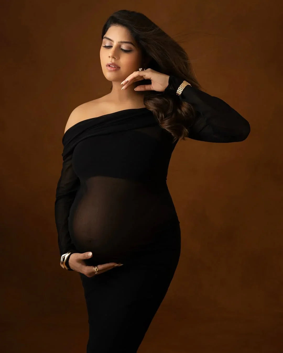 Tiffany Mesh Bodycon Gown by FlairNFrillz, a stylish maternity dress with a fitted mesh design, perfect for special occasions.