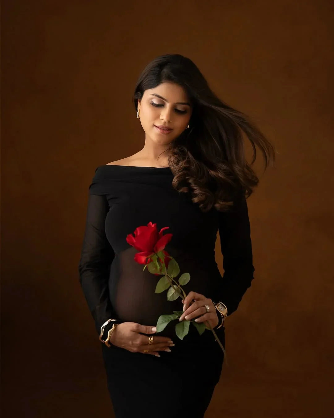 FlairNFrillz Tiffany Mesh Bodycon Gown maternity dress in elegant black with mesh detailing, fitted style, and long sleeves.
