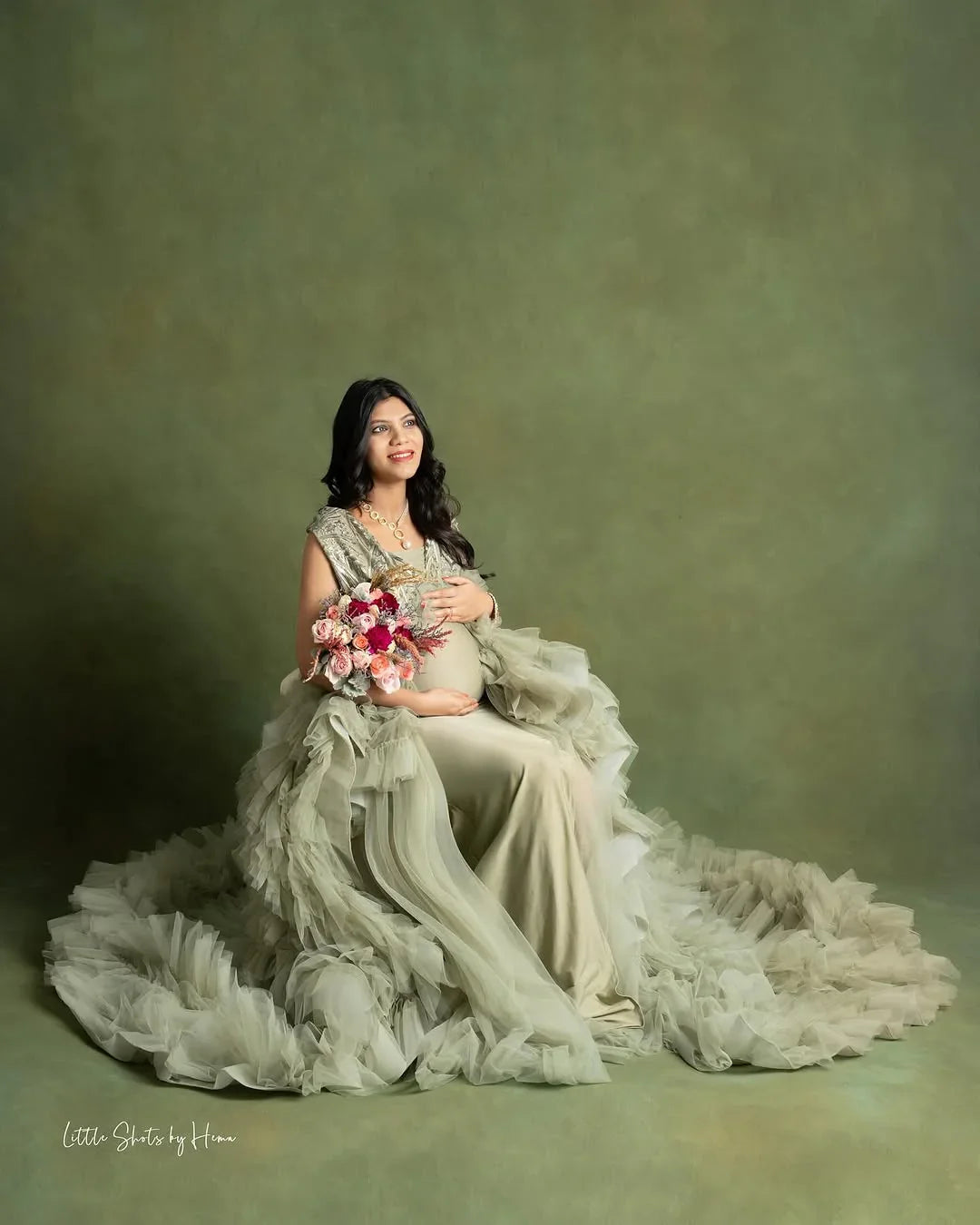 FlairNFrillz Veda Maternity Gown featuring elegant fabric and flowing design, perfect for expecting mothers.