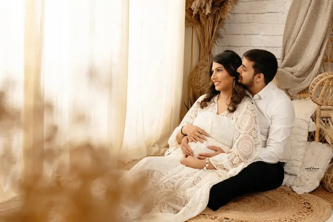 Zoya Boho Lace Gown by FlairNFrillz, elegant maternity dress with lace detailing, flowing fabric, and bohemian style.