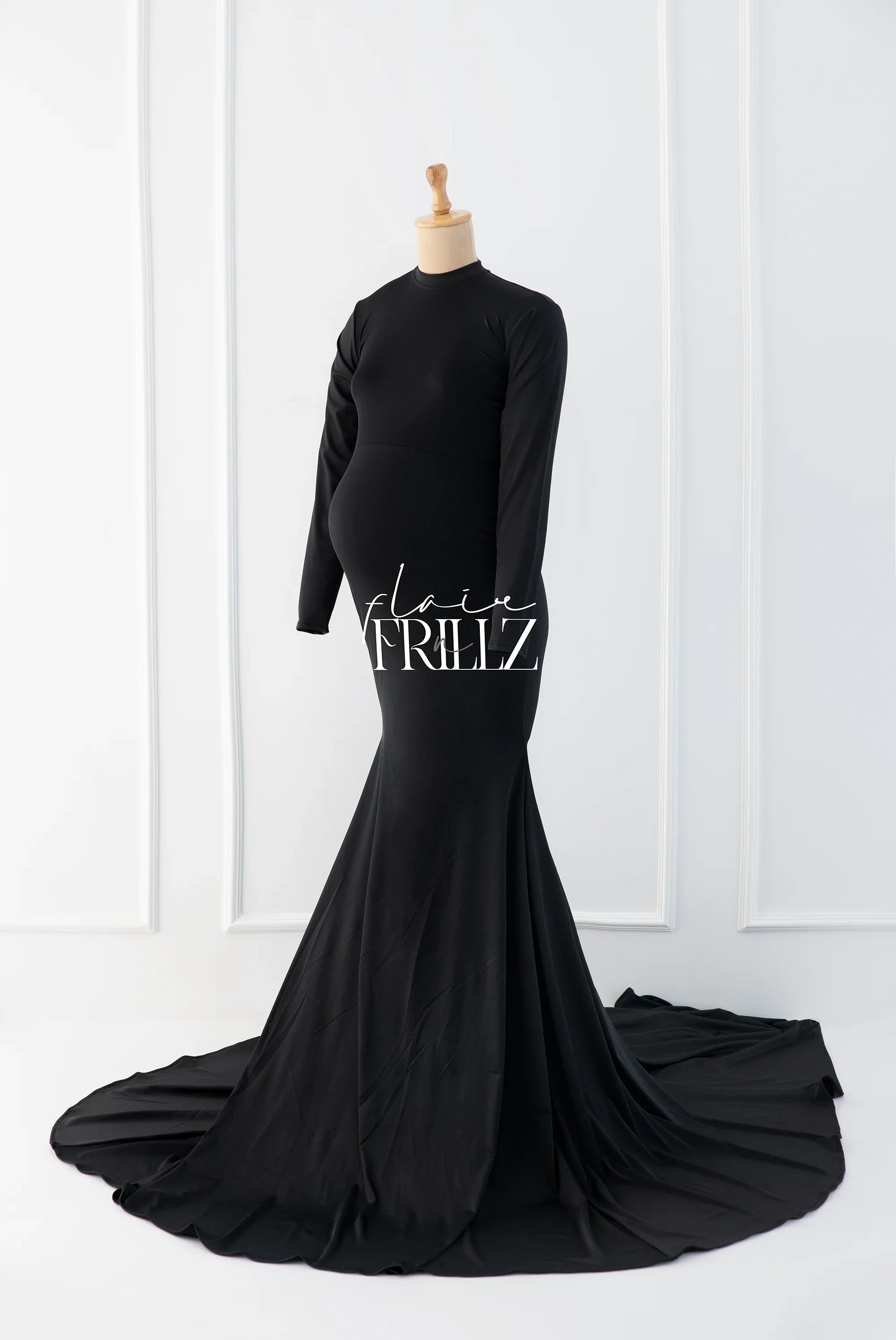 Black bodycon maternity gown with long sleeves and floor-length train on mannequin