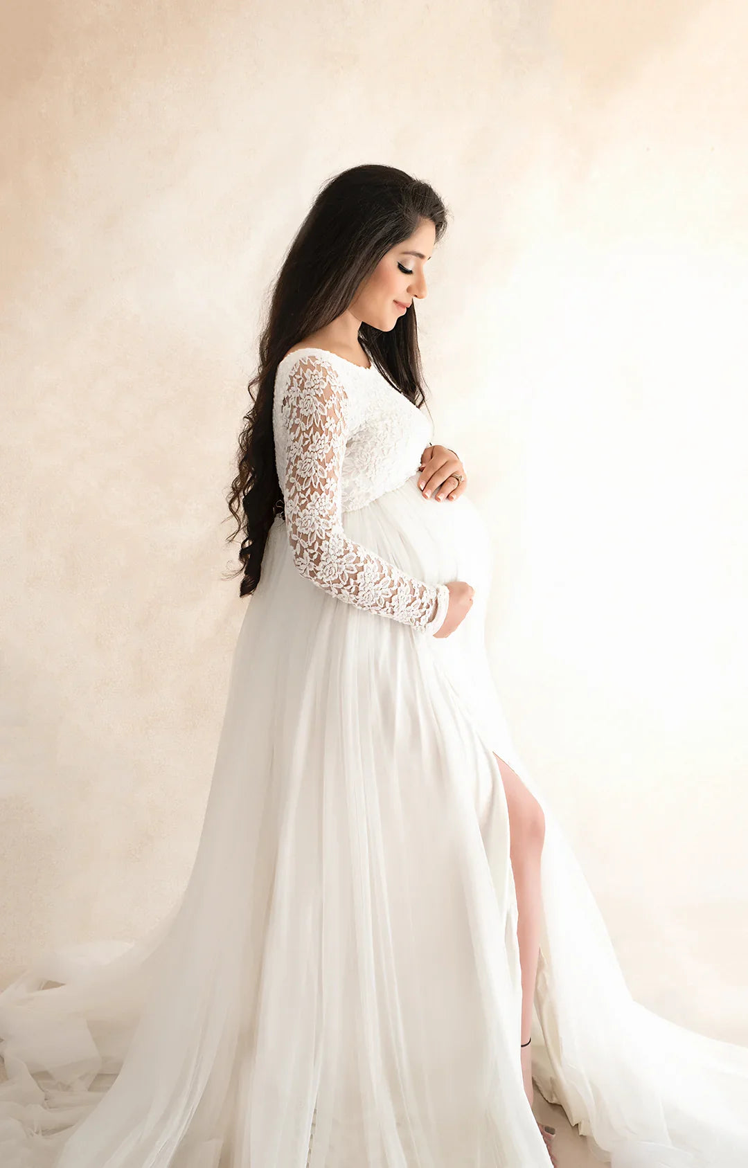 FlairNFrillz Dylan White Maternity Gown with flowing fabric and elegant design, perfect for expecting mothers.
