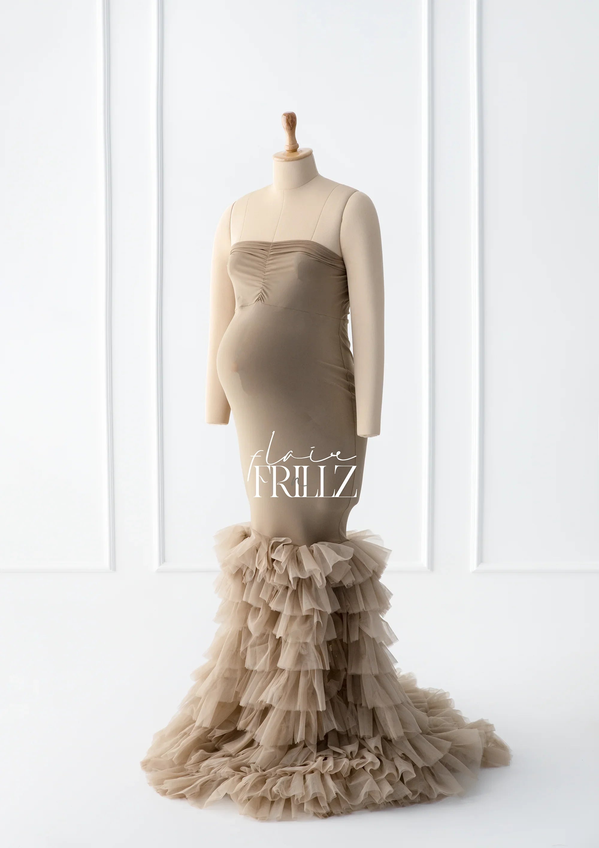 Taupe maternity gown with ruched bodice and tiered tulle ruffle skirt on mannequin