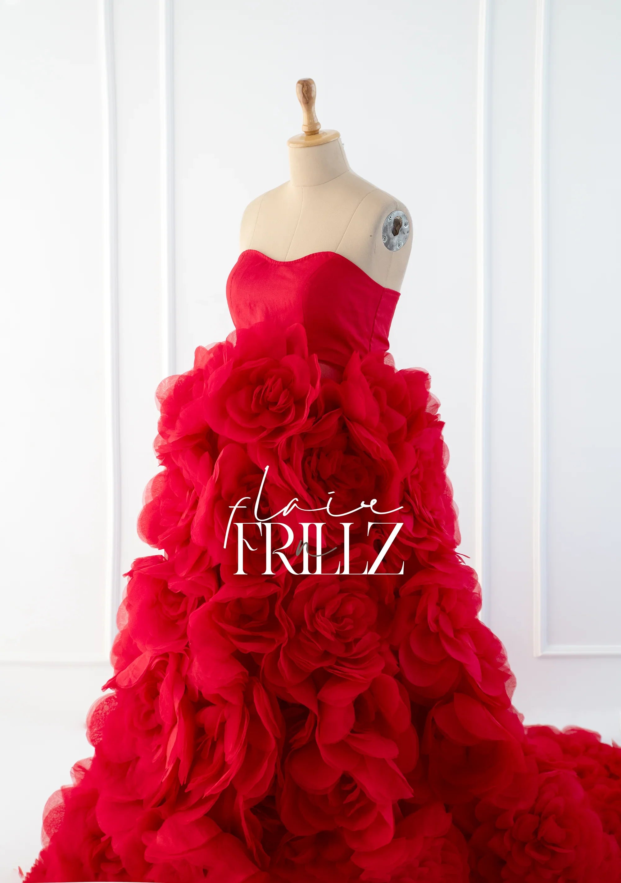 Red floral maternity gown by FlairNFrillz featuring a flowing design and elegant fit, perfect for expecting mothers.