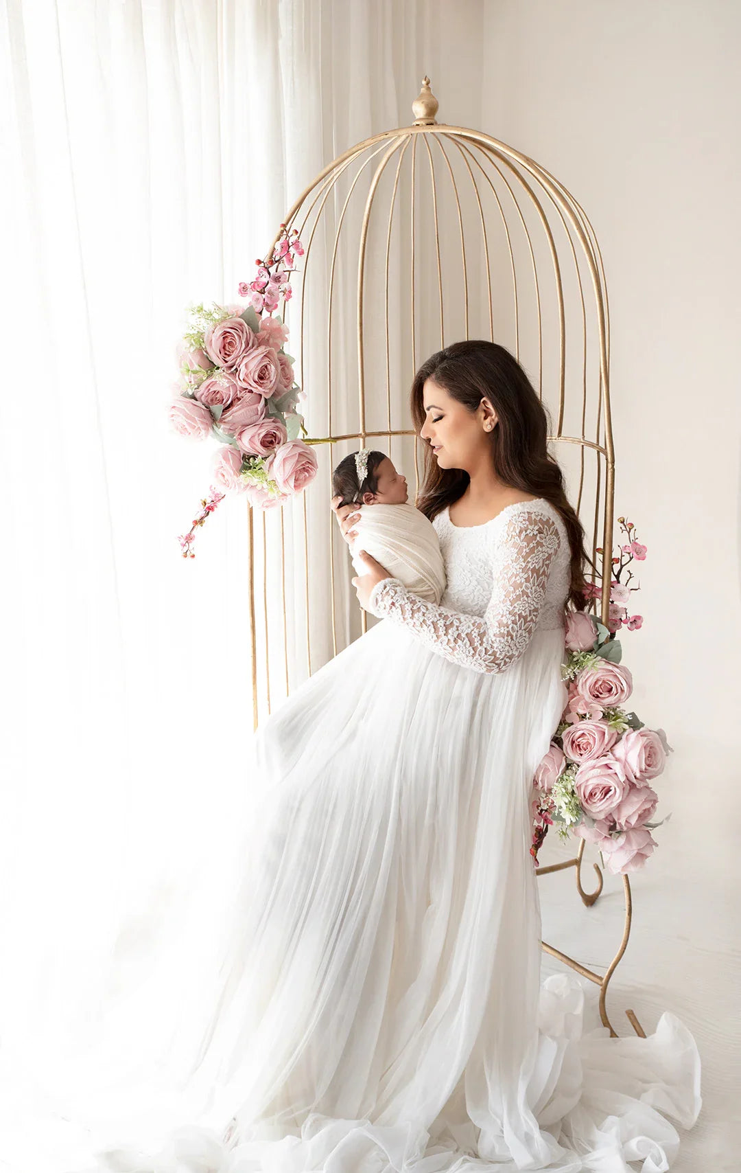 Dylan White maternity gown by FlairNFrillz, flowing white maternity dress with elegant design and comfortable fit.