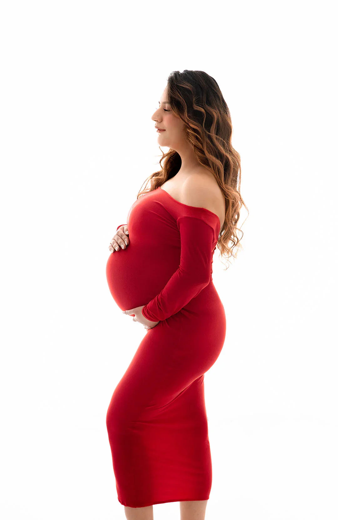 FlairNFrillz Avery maternity gown featuring flowing fabric and elegant design for comfortable pregnancy wear.