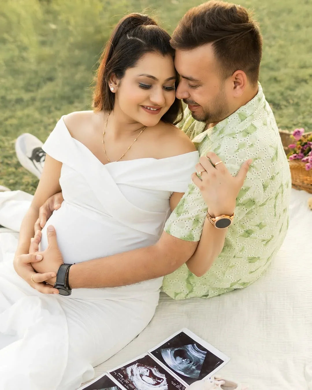 FlairNFrillz Isla White Maternity Gown with flowing fabric and elegant design, perfect for expecting mothers.