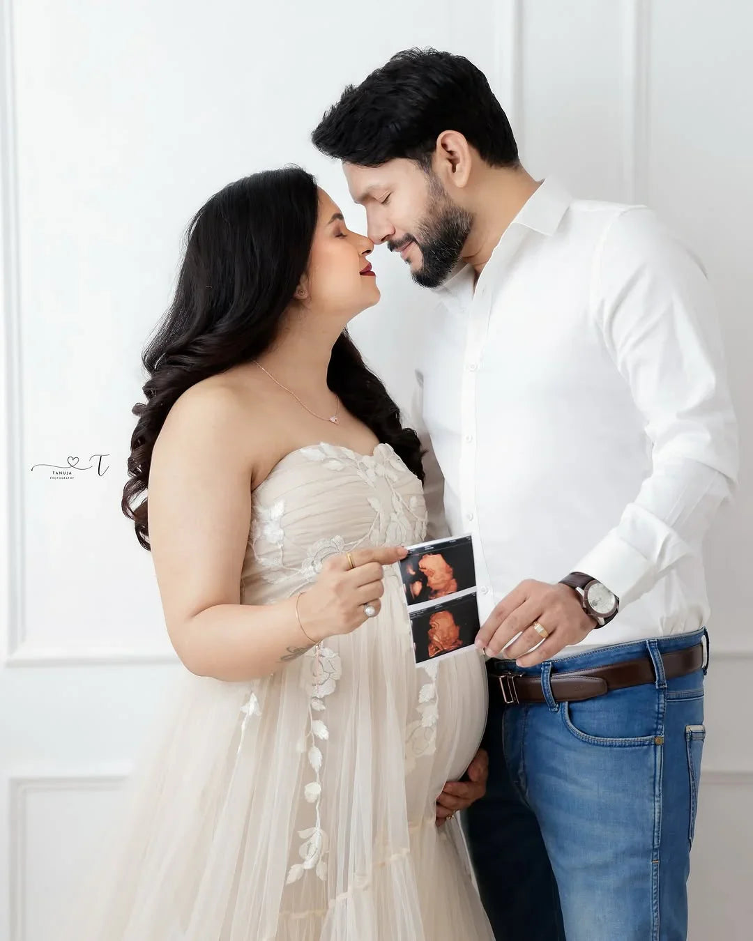 Elegant Elsa maternity gown by FlairNFrillz, flowing fabric with a fitted bodice, perfect for expecting mothers.