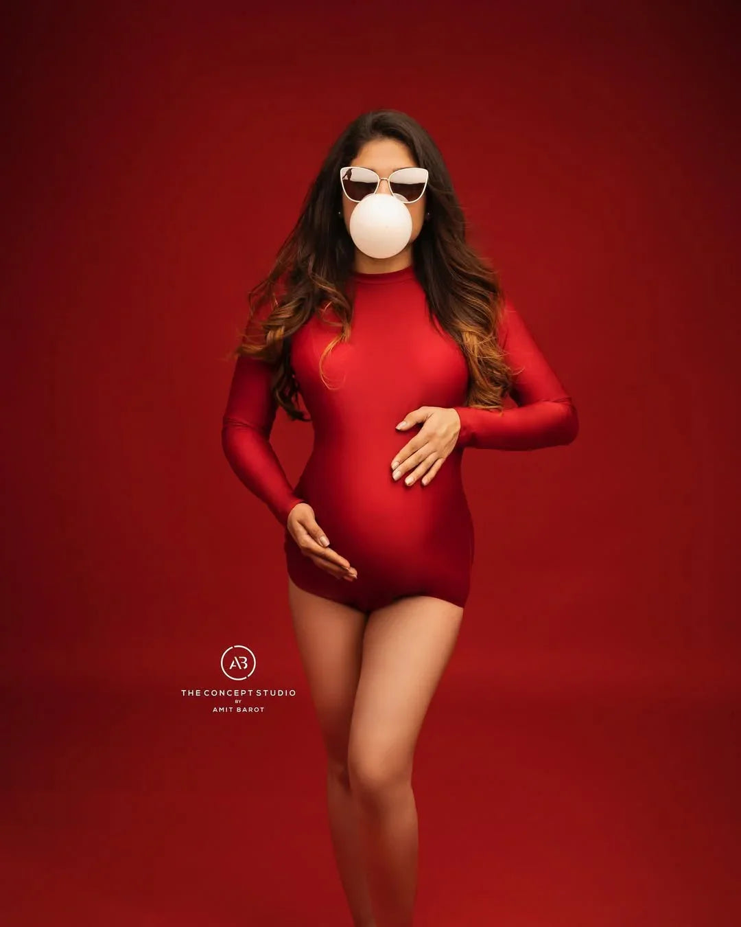Maroon maternity bodysuit from FlairNFrillz, designed for summer, featuring a comfortable fit and stylish look.