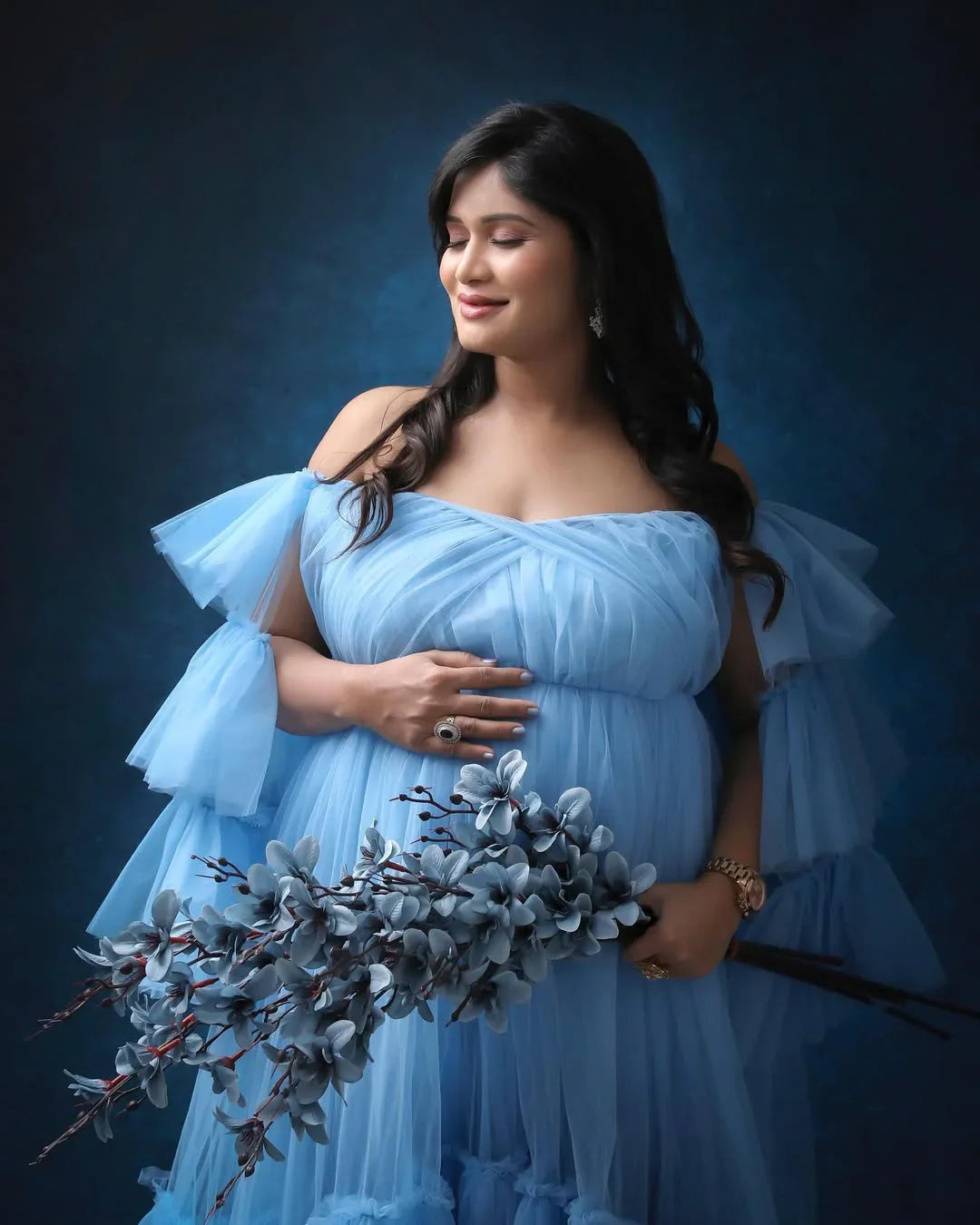 Maternity dress by FlairNFrillz, Keira Blue Gown, flowing fabric with empire waist and long sleeves, perfect for expecting mothers.