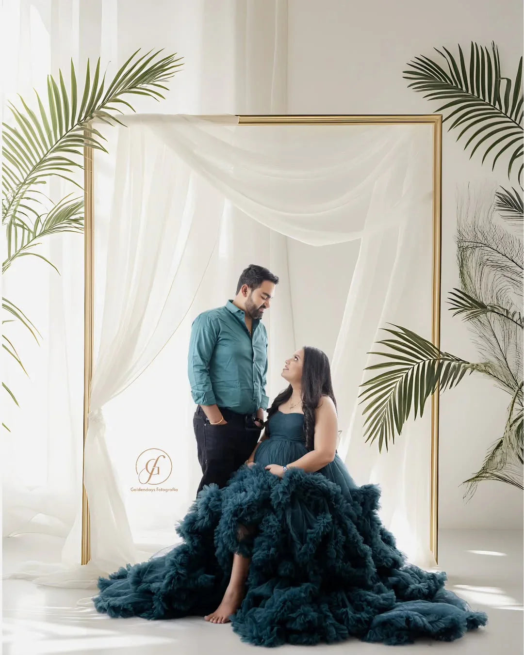 FlairNFrillz Saige Blue Maternity Dress showing flowing fabric and elegant design for expectant mothers.