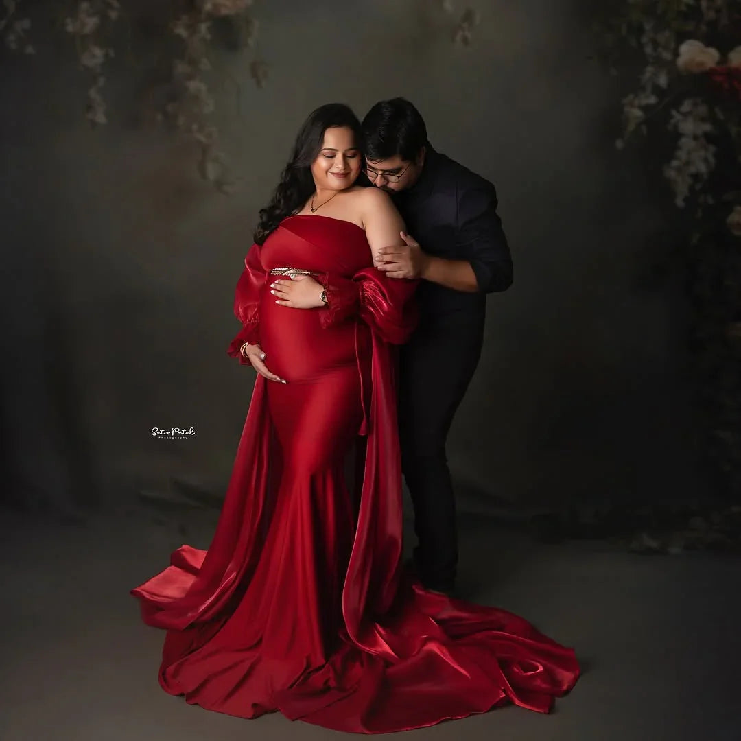Lyla Red maternity gown by FlairNFrillz featuring a flowing design, soft fabric, and elegant style perfect for expecting mothers.