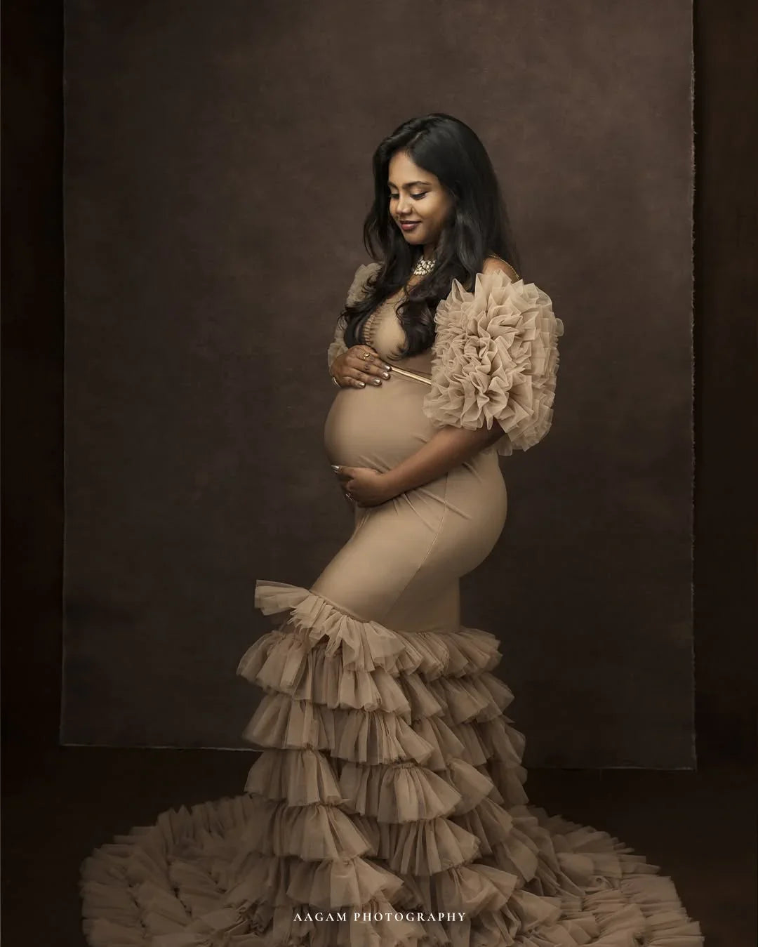 Ember Nude maternity gown by FlairNFrillz featuring flowing fabric and elegant design, perfect for expecting mothers.