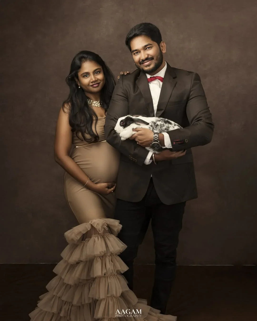 Ember Nude Maternity Dress by FlairNFrillz, flowing fabric with a soft, elegant design suitable for expecting mothers.