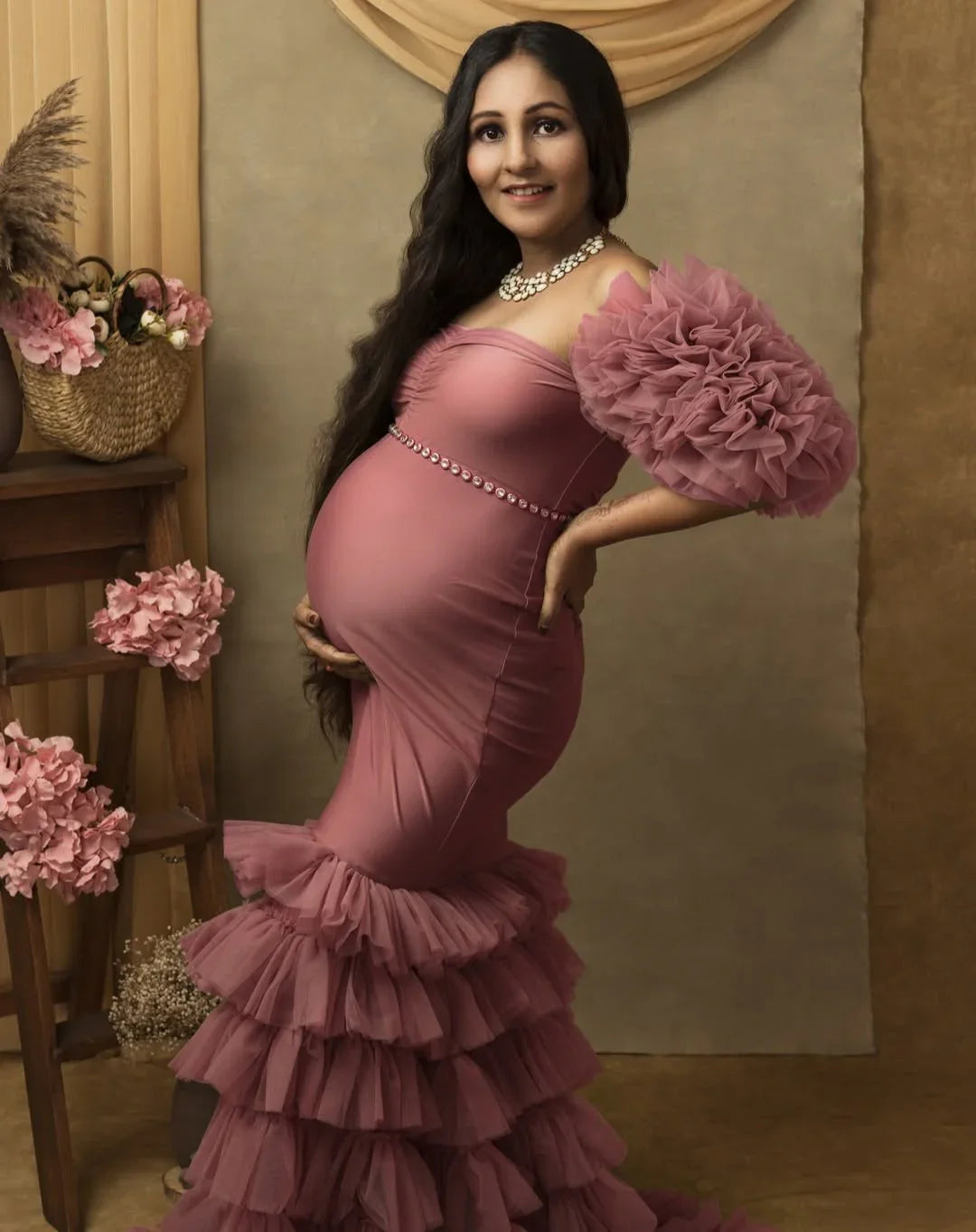 Ember Pink maternity gown by FlairNFrillz featuring a flowing fabric and elegant design for expecting mothers.