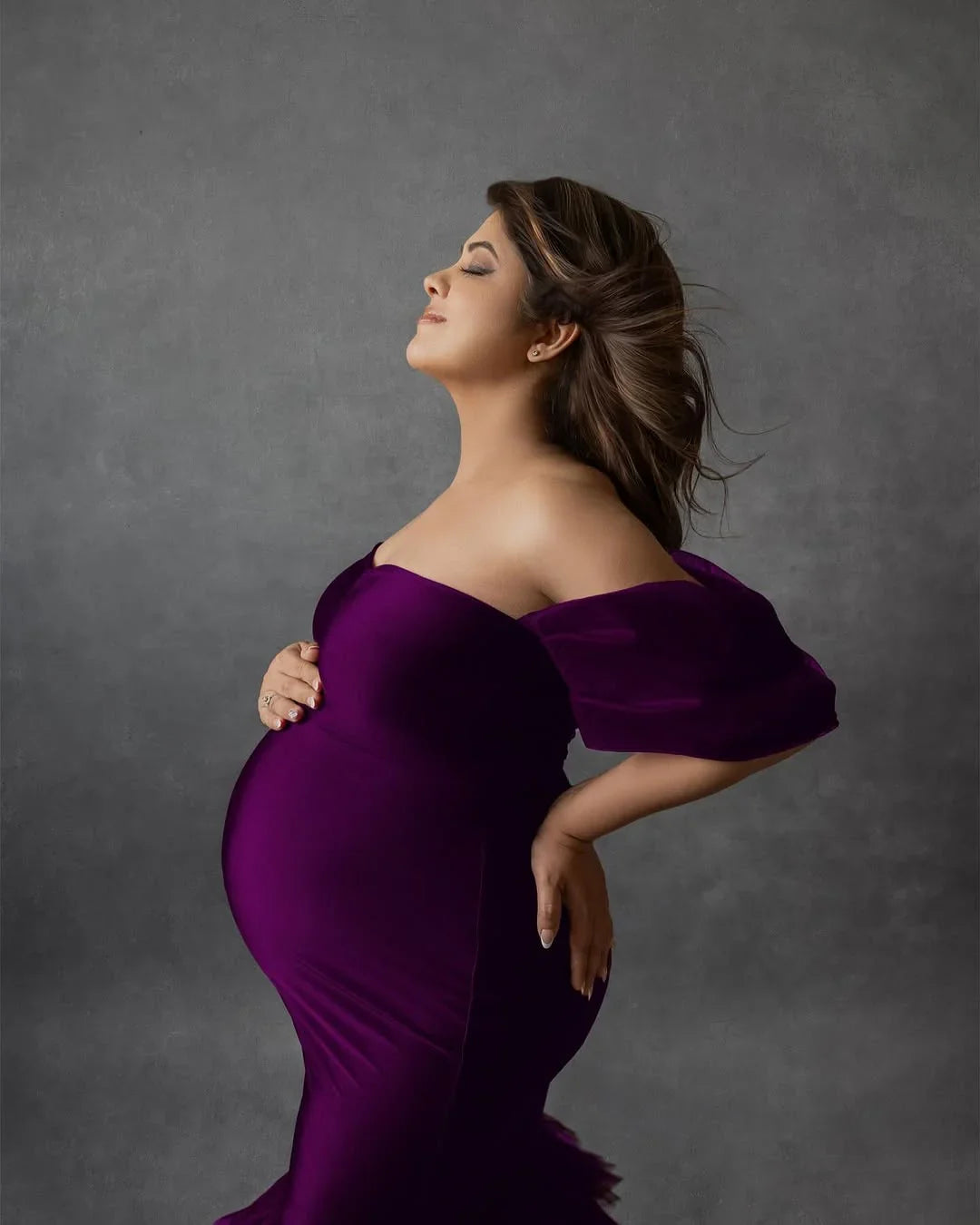FlairNFrillz Ember Wine maternity gown featuring elegant design and flowing fabric, perfect for special occasions and maternity photos.