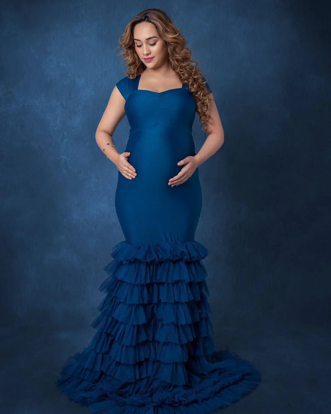 FlairNFrillz Ember Teal maternity gown featuring flowing fabric and elegant design for expectant mothers.