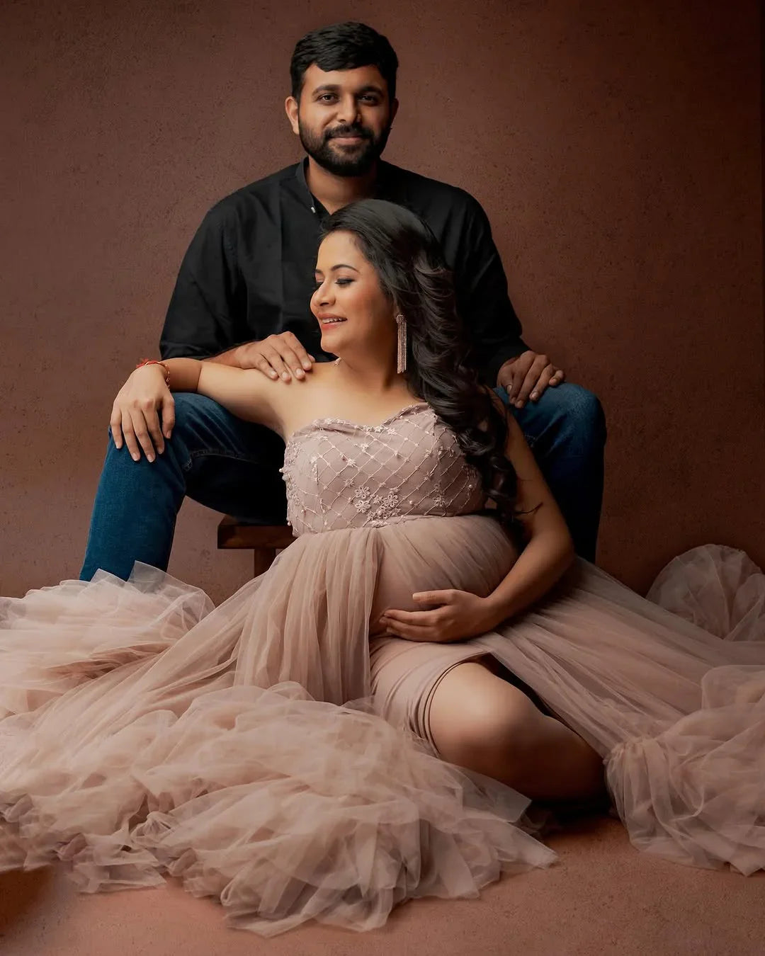 FlairNFrillz Dallas Gown maternity dress in soft fabric, featuring a flowing design with gentle draping and elegant style.
