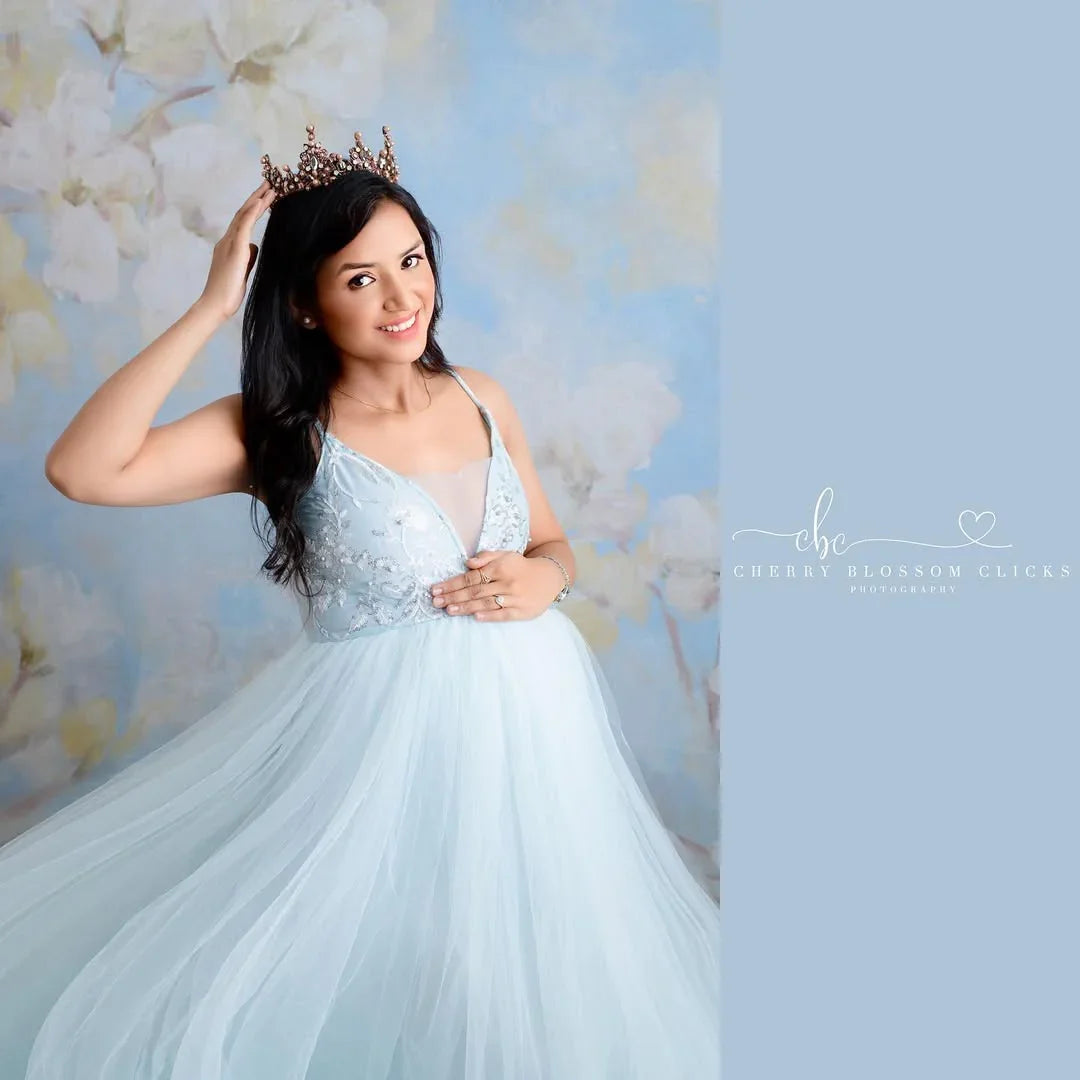 Alia Blue Maternity Dress by FlairNFrillz featuring a flowing fabric and elegant design, perfect for expecting mothers.