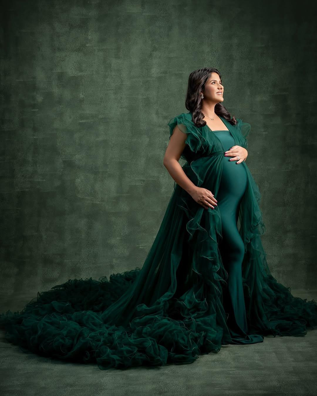 Green Margot maternity robe gown from FlairNFrillz featuring a flowing design and comfortable fit for expecting mothers.