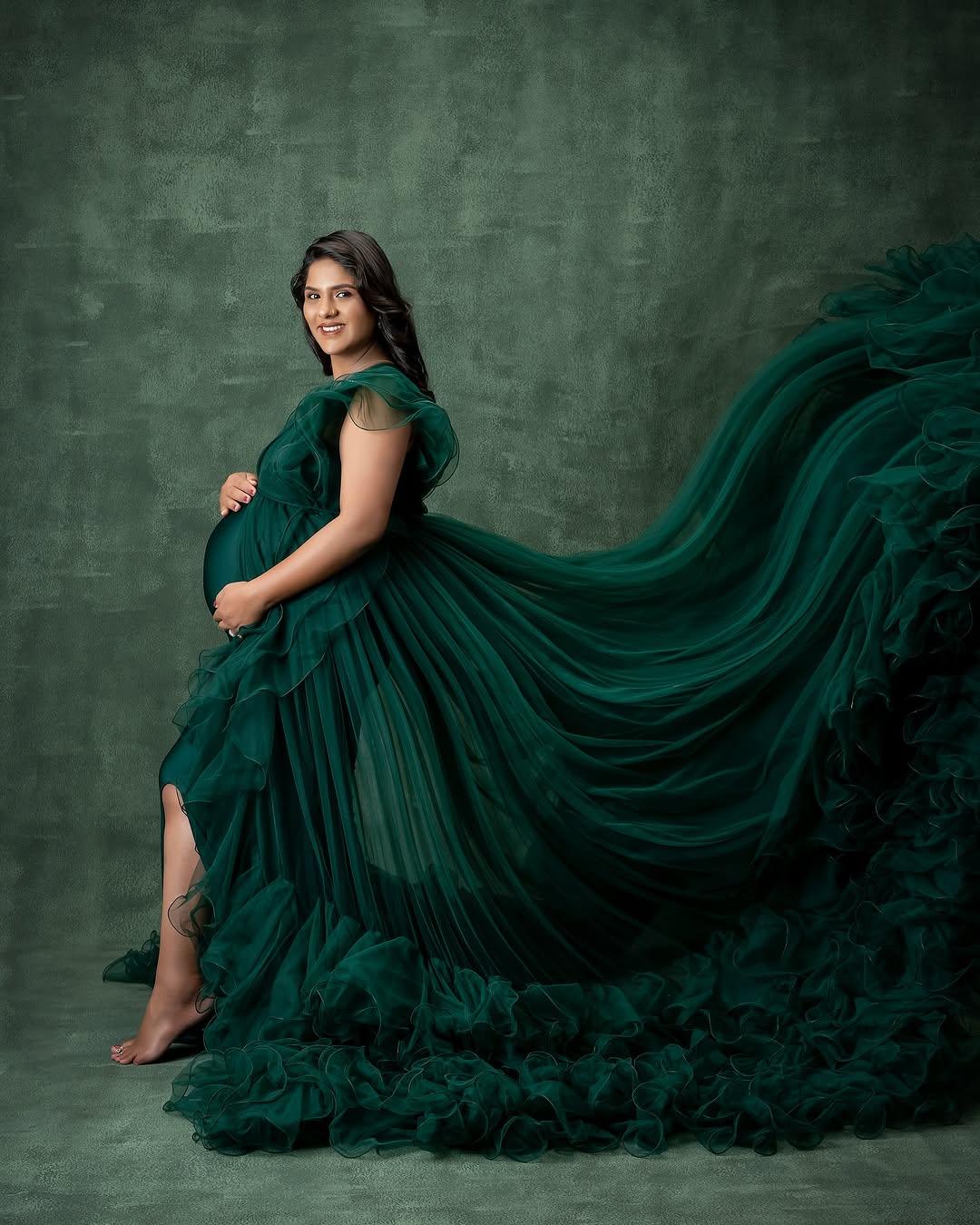 Green Margot maternity robe gown by FlairNFrillz, flowing fabric with a relaxed fit, perfect for comfortable maternity wear.