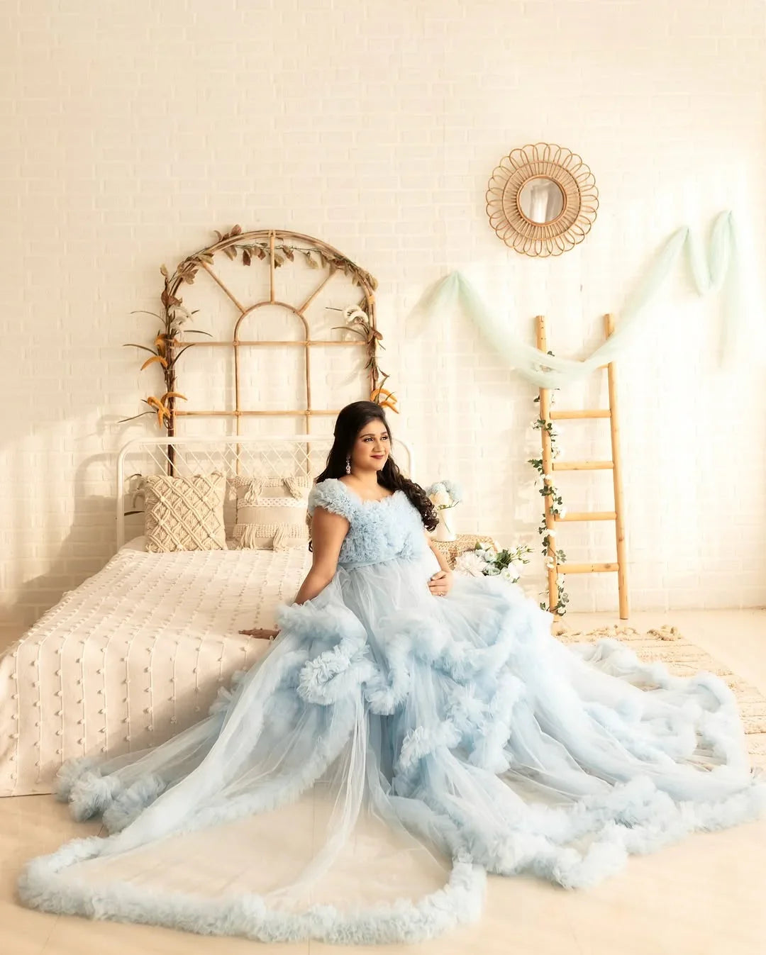 Blue Erin maternity gown by FlairNFrillz featuring flowing fabric and elegant design, perfect for expecting mothers.