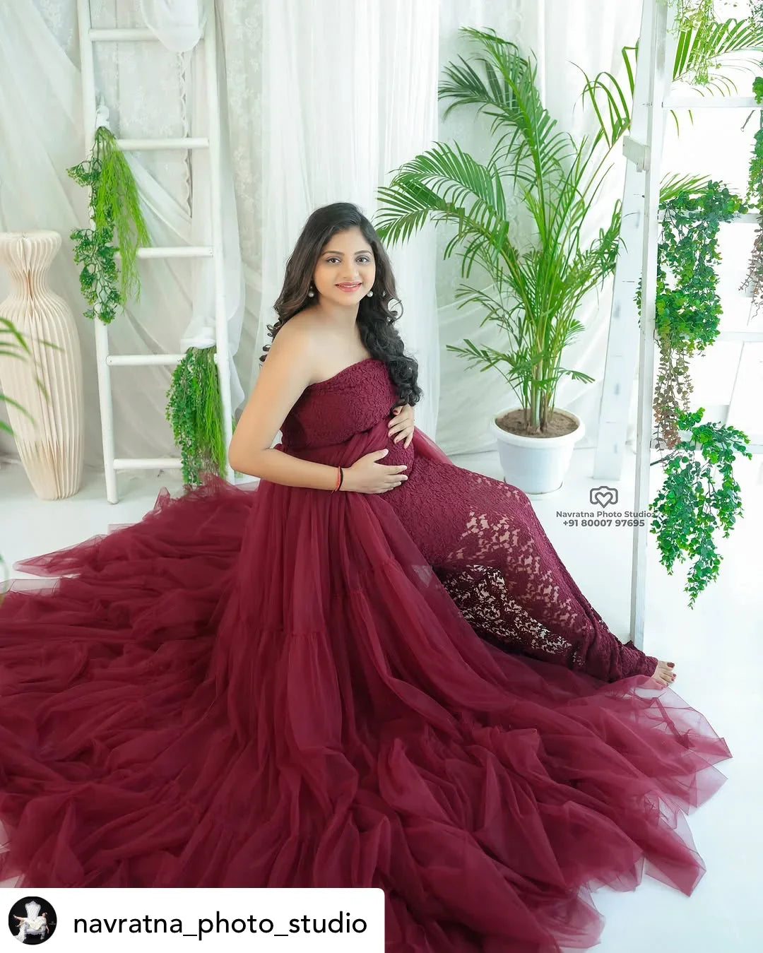 Elegant Ellen Gown maternity dress in eggplant purple from FlairNFrillz, featuring flowing fabric and comfortable fit for expecting mothers.