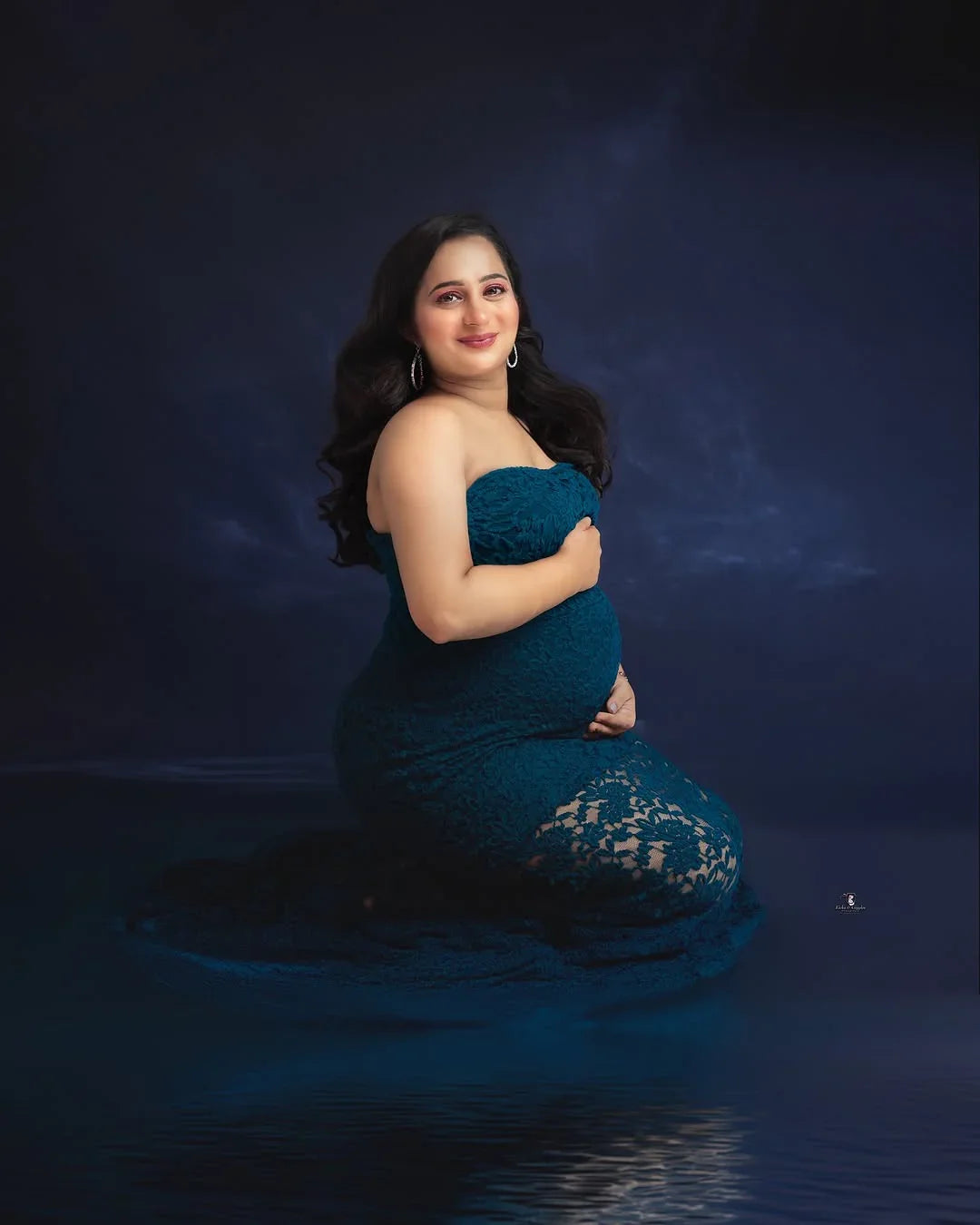 FlairNFrillz Ellen Blue Maternity Dress featuring flowing fabric and elegant design, perfect for expecting mothers.