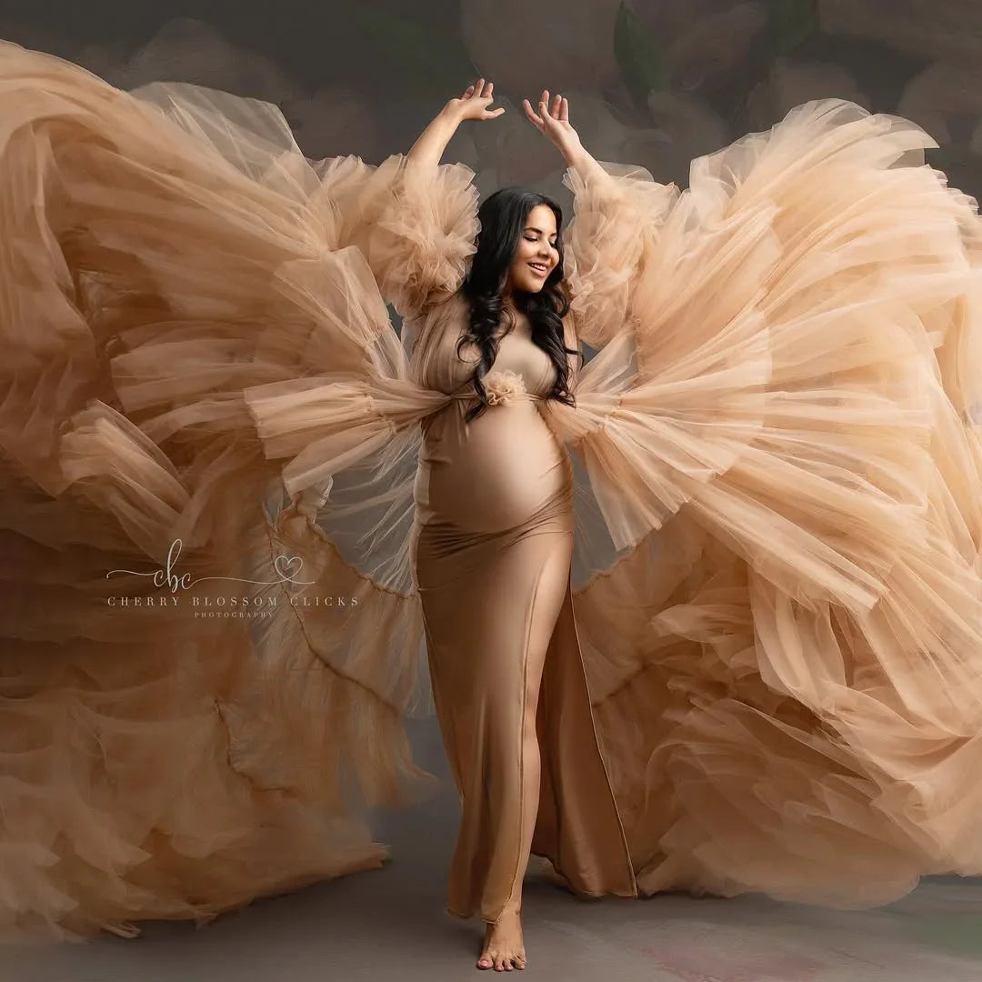 FlairNFrillz Sofia Nude Maternity Robe Gown displayed on a model, showcasing its soft fabric and relaxed fit for expecting mothers.