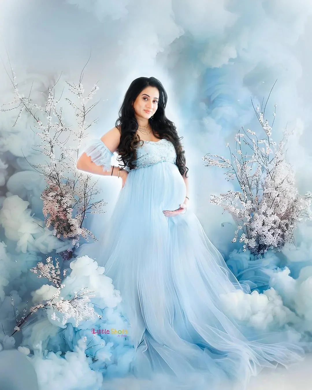 FlairNFrillz Kaya Blue Sequin Maternity Gown with elegant design, flowing fabric, and sparkling sequin details for special occasions.