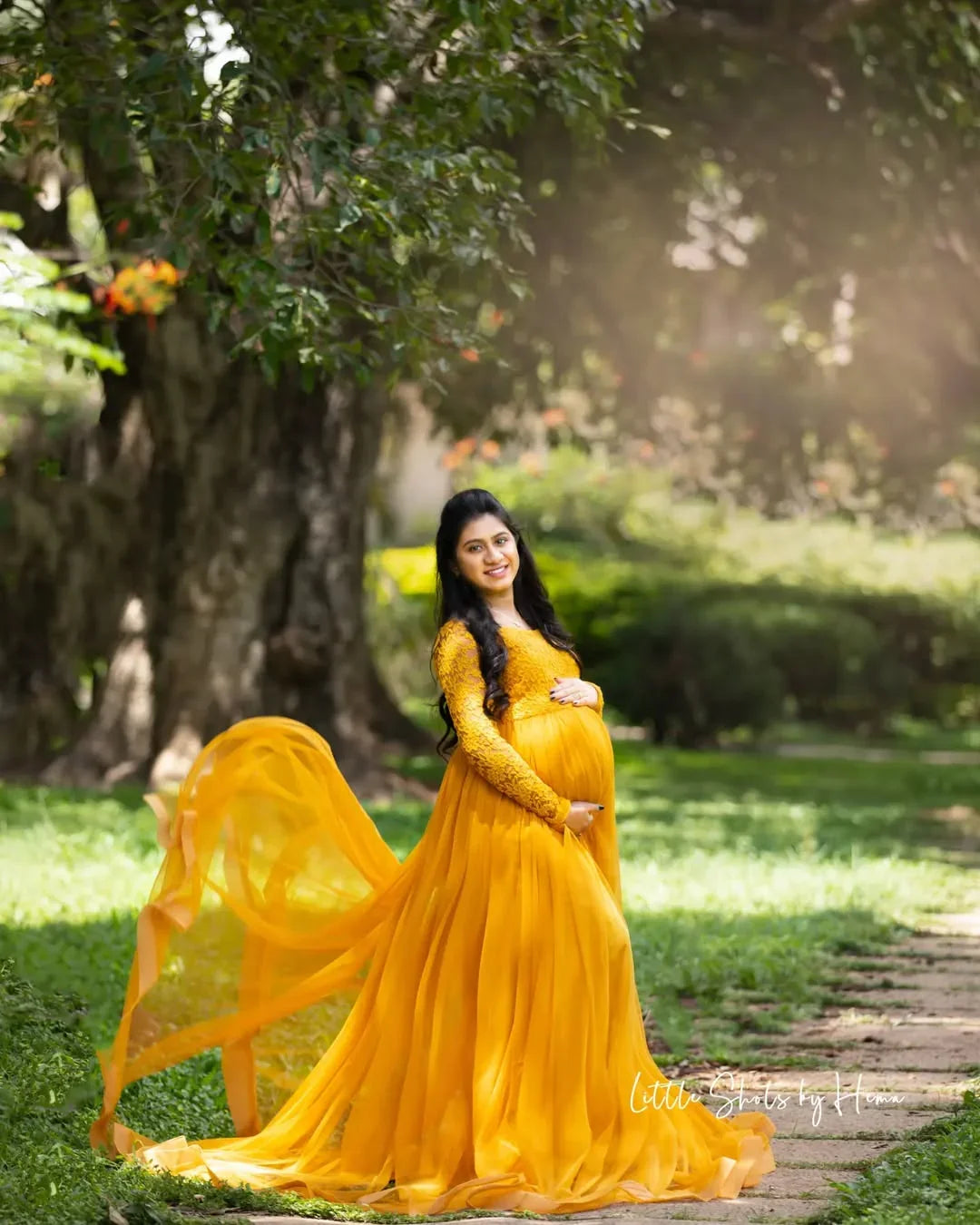 Dylan Lavender Maternity Gown by FlairNFrillz featuring flowing fabric and elegant design, perfect for expecting mothers.