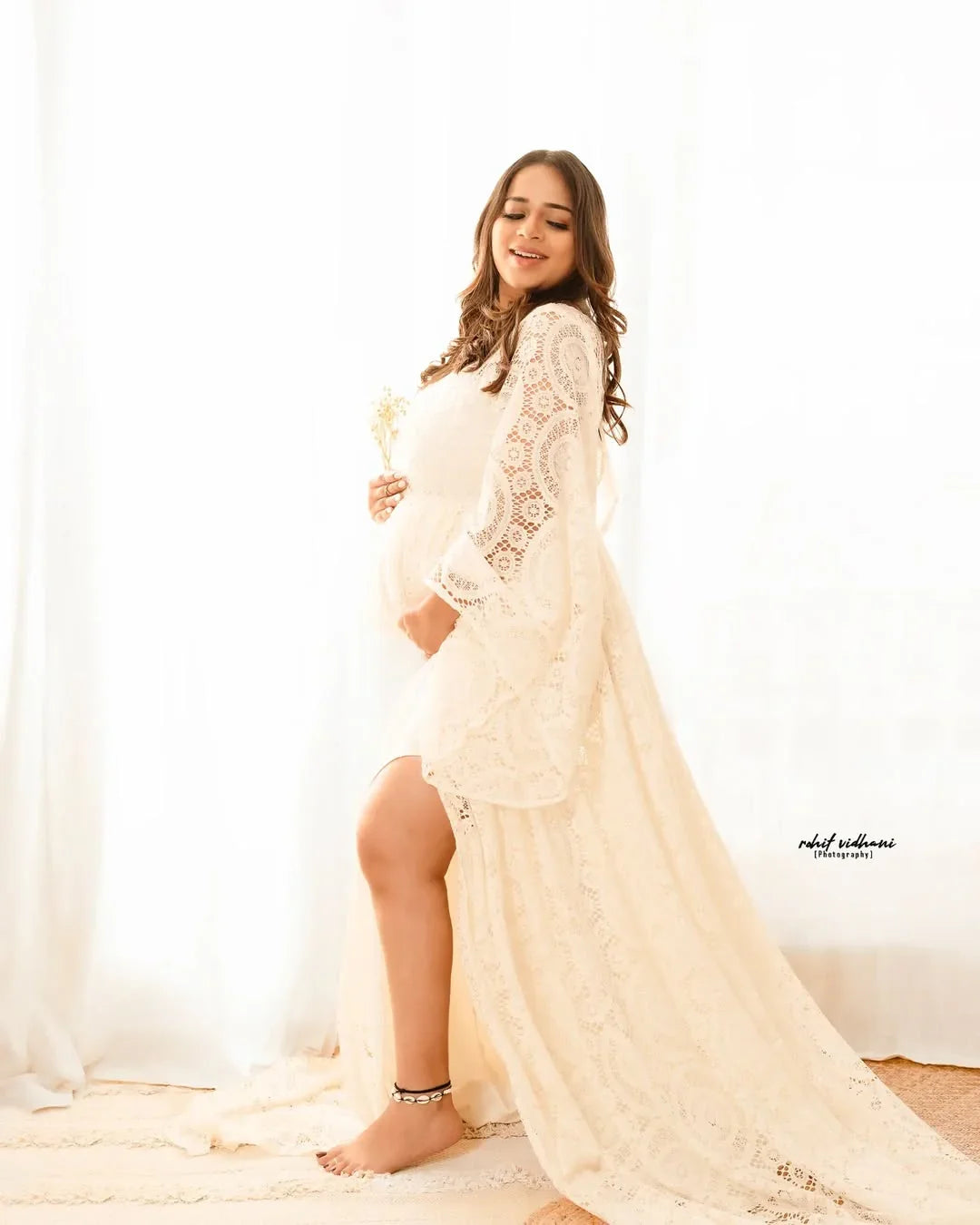 FlairNFrillz Zoya Boho Lace Maternity Dress with flowing fabric and intricate lace details, perfect for expecting mothers.