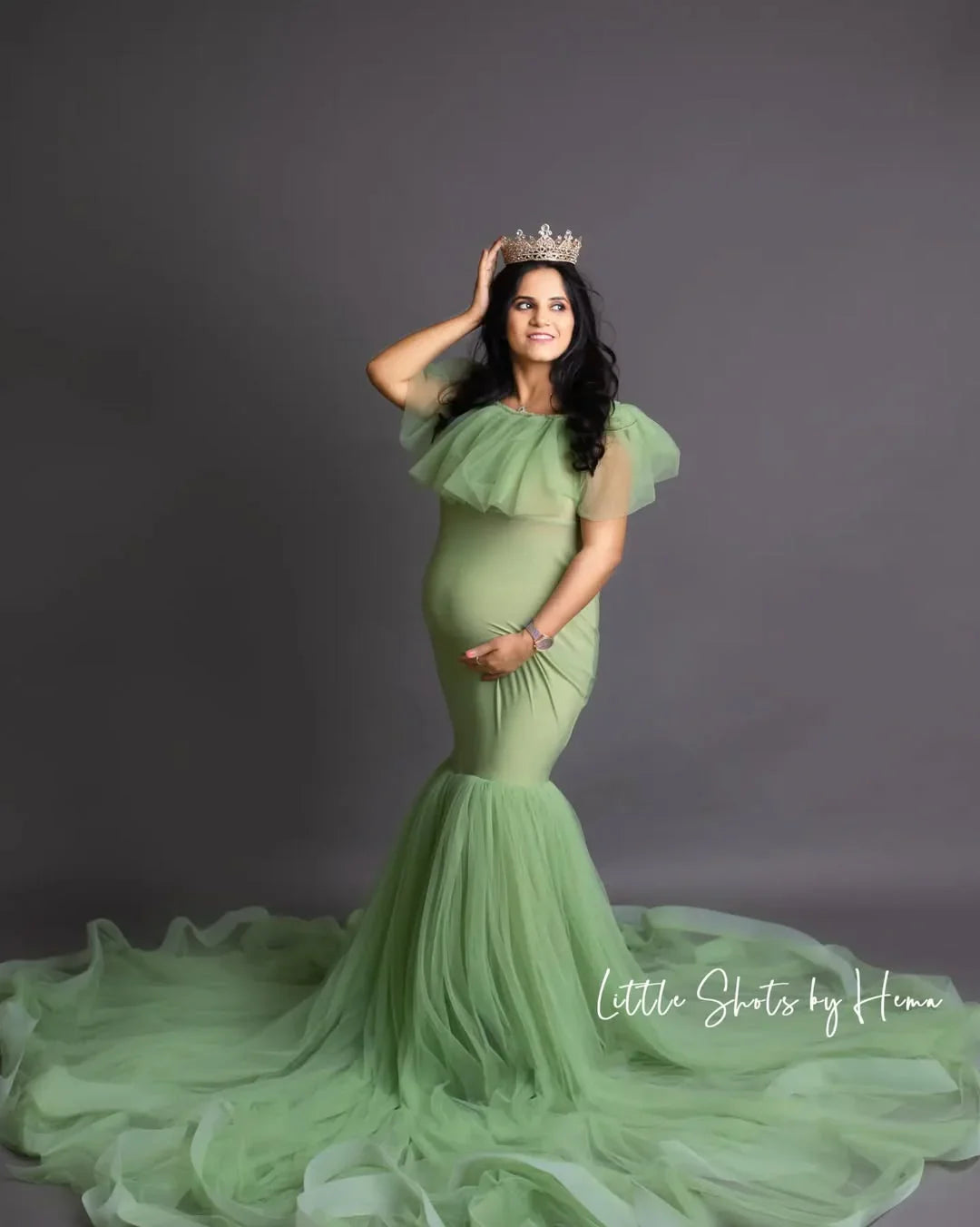 FlairNFrillz Greta Gown maternity dress featuring a flowing fabric and elegant design, perfect for expecting mothers.
