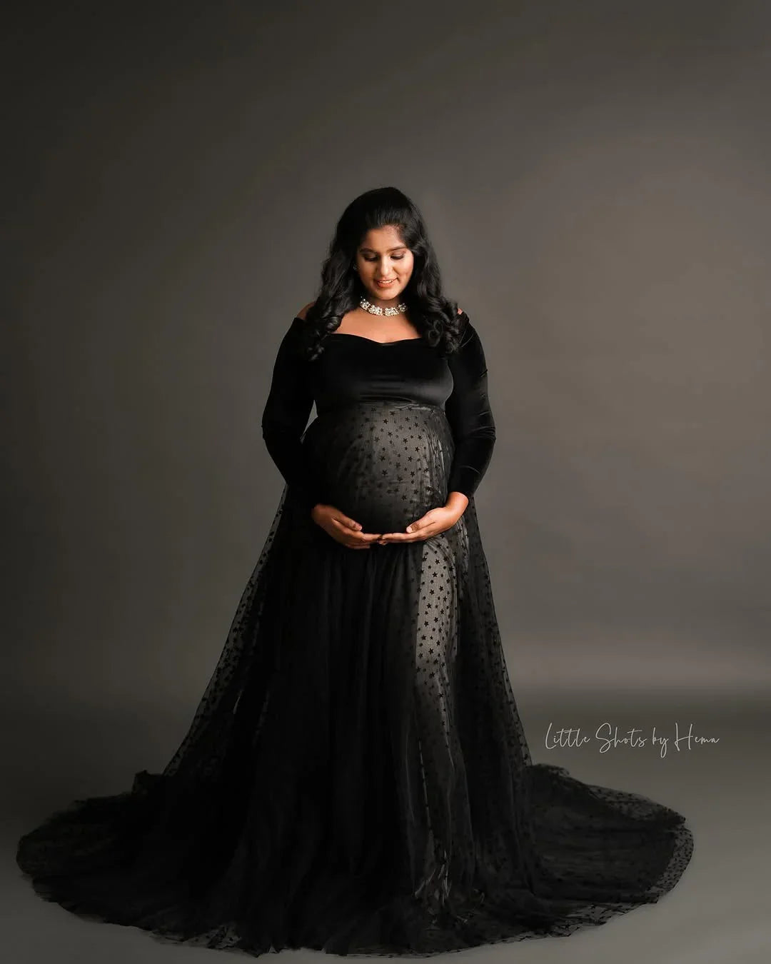 FlairNFrillz Iliana Maternity Gown featuring elegant fabric and flowing design, perfect for expecting mothers.