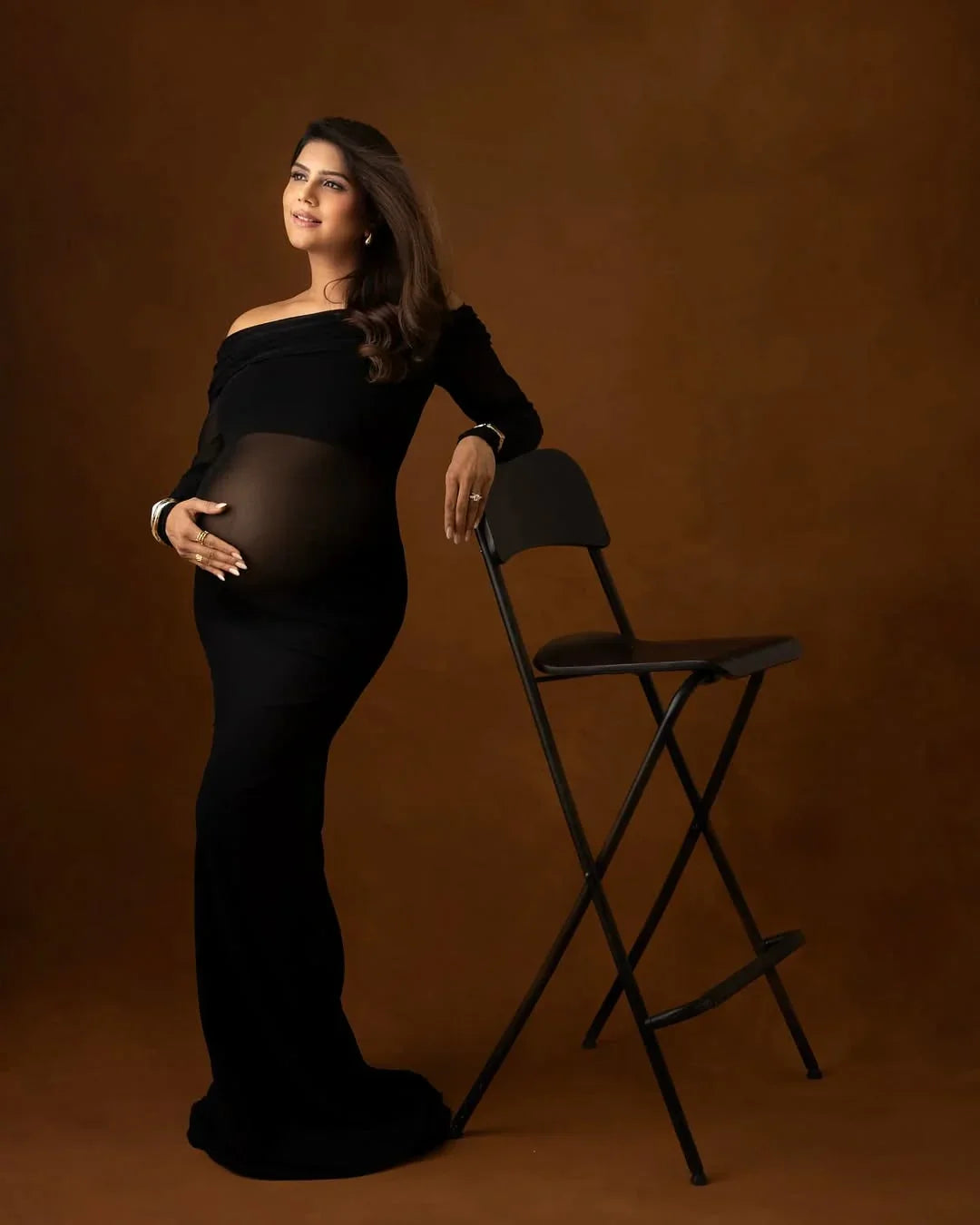 Tiffany Mesh Bodycon Gown by FlairNFrillz, elegant maternity dress with fitted silhouette and sheer mesh details.